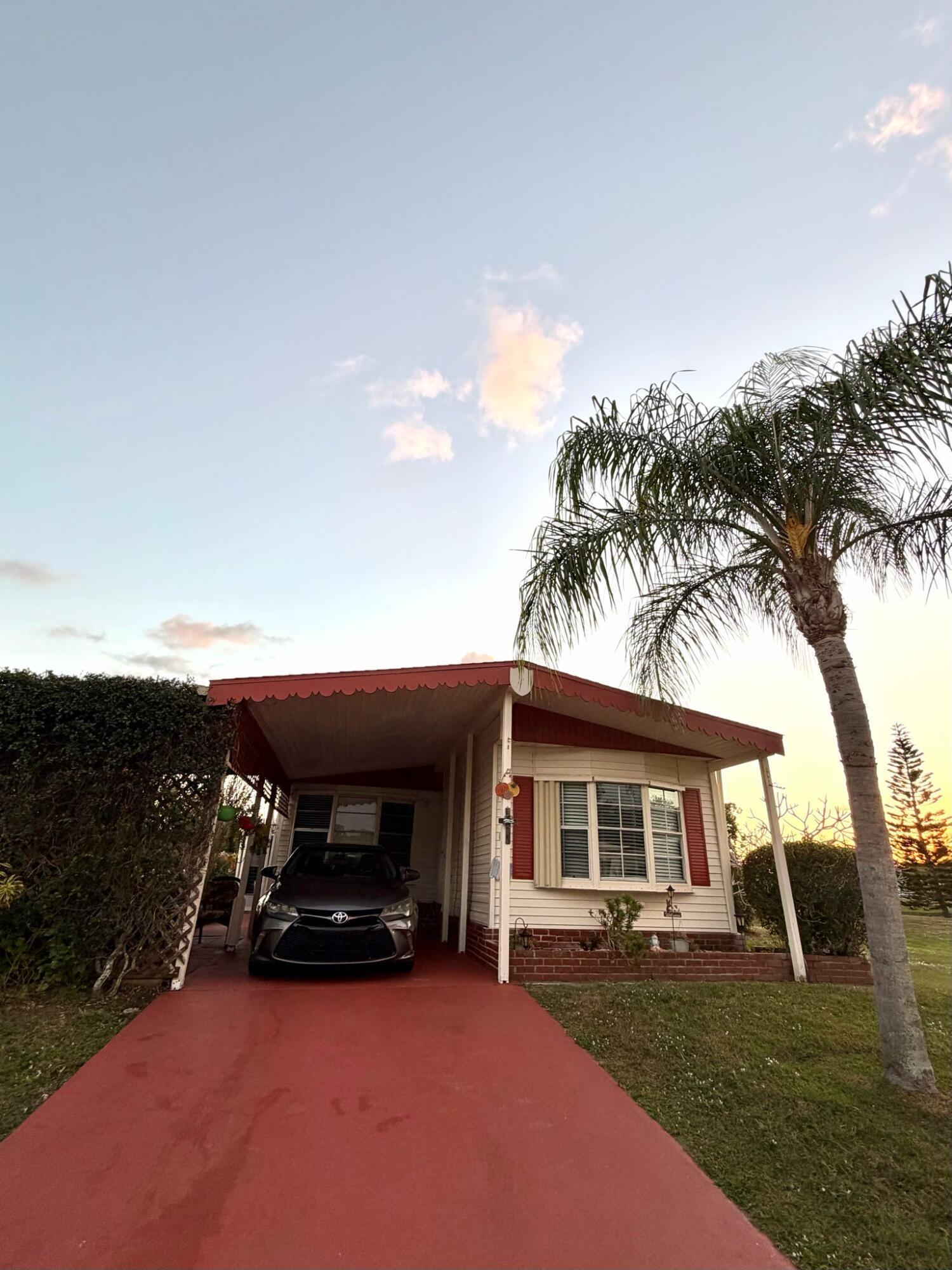 Welcome to this charming 2-bedroom, 2-bathroom manufactured home situated in Spanish Lakes Golf Village in Port St. Lucie, Florida. Spanning 1,575 square feet of finished living space on a single floor, this residence offers comfortable and functional living. As a waterfront property, this home provides the distinctive appeal of water access while maintaining the affordability and ease of maintenance that manufactured homes offer. Located within the established Spanish Lakes Golf Village community, this property presents an excellent opportunity for those seeking a practical home with waterfront living potential.