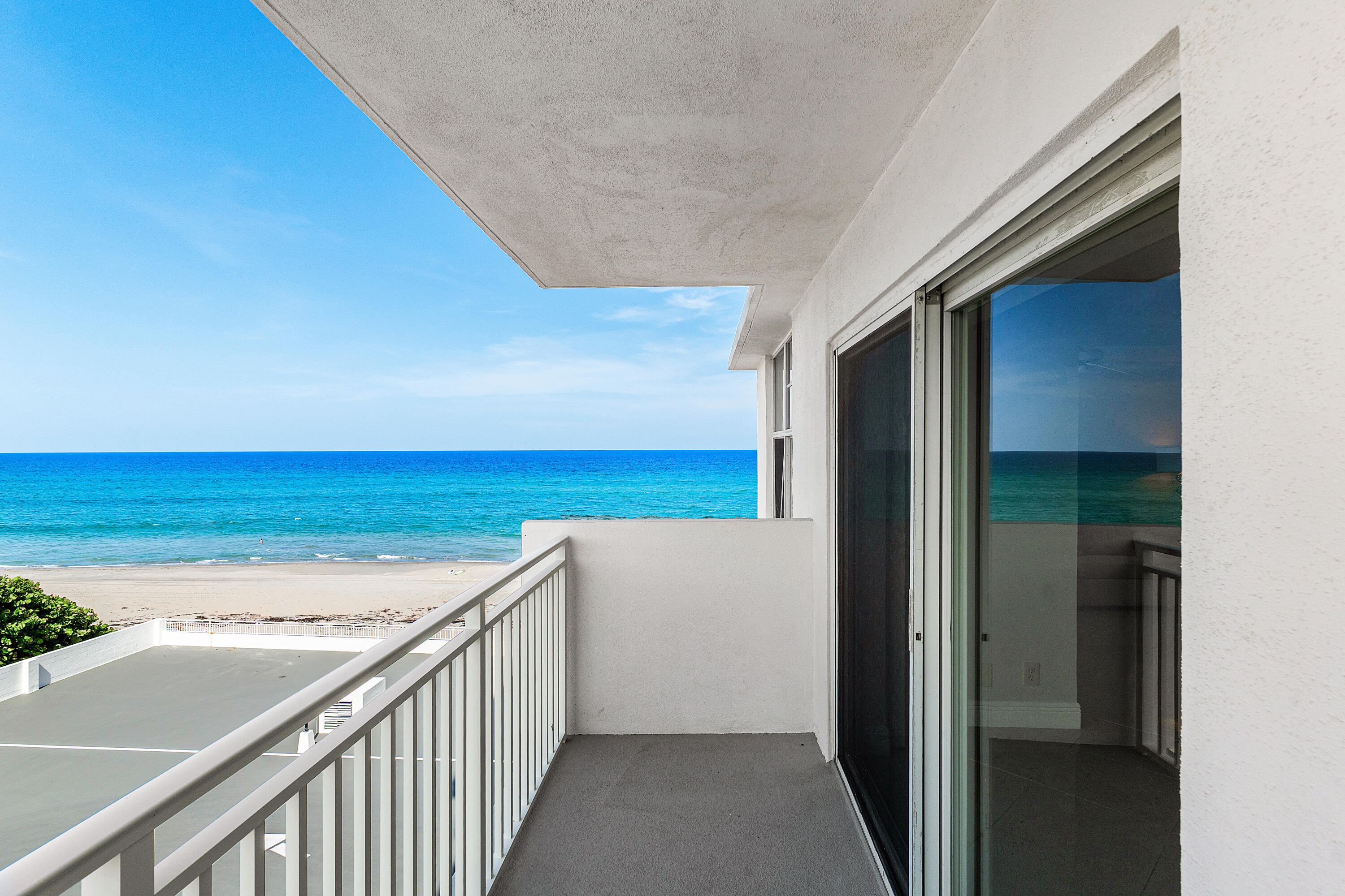 Direct oceanfront living in the heart of Highland Beach at a price that makes sense. This 2-bed, 2-bath residence at 45 Ocean sits on the 3rd floor with true ocean views from every room and a north-facing exposure that keeps the unit bright and cool all day. The open layout flows effortlessly with a spacious master suite and a flexible second bedroom perfect as a guest space, home office, or den. No waiting period for rentals. Monthly fees cover cable, WiFi, security, and maintenance. Steps to the sand. One covered space included. Don't miss this value. 45 Ocean is a guard gated oceanfront community in highly desirable Highland Beach, one of South Florida's most exclusive coastal towns. This unit offers some of the best direct ocean views in the building with a north-facing orientation that provides natural light and cool ocean breezes without the harsh afternoon sun. The unit is move-in ready and vacant — easy to show. Community amenities include a resort-style pool, fitness center, community room, elevator access, and on-site storage. One dedicated garage space is included — rare at this price point. Offering buyers peace of mind on one of the most significant capital expenditures in a condo association. The association allows rentals with no waiting period, offering flexibility for investors or part-time residents (one rental per year, 90-day minimum). Monthly fees of $1,601 include cable, WiFi, elevator maintenance, security, trash, and grounds maintenance. One pet welcome (15 lb max). Located just north of Boca Raton, minutes from world-class dining, shopping, and the Intracoastal. Priced aggressively for a quick sale.