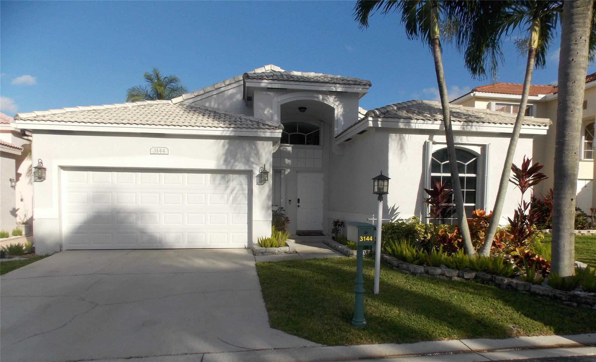Amazing bright & very desirable modern home centrally located near exquisite dinning & shopping. A TRUE READY TO MOVE IN HOME featuring formal living & dining rooms, updated kitchen w/quarts counter, newer stainless-steel appliance, water heater, remodeled guest bathroom, high ceilings, open floor plan w/split bedrooms & tiled throughout.  Newer A/C, screened patio great for relaxing, BBQ’s & social gatherings. Room for pool in this manicured private fenced yard, 2 car garage, tiled roof, hurricane shutters, very low traffic area, small neighborhood w/yearly heated community pools & recreation centers. Plenty of space for outdoor events. Centrally located between Sawgrass Mall express way & 441hgw. Walking distance to city parks & short drive to Casinos, dinning & night entertainment...