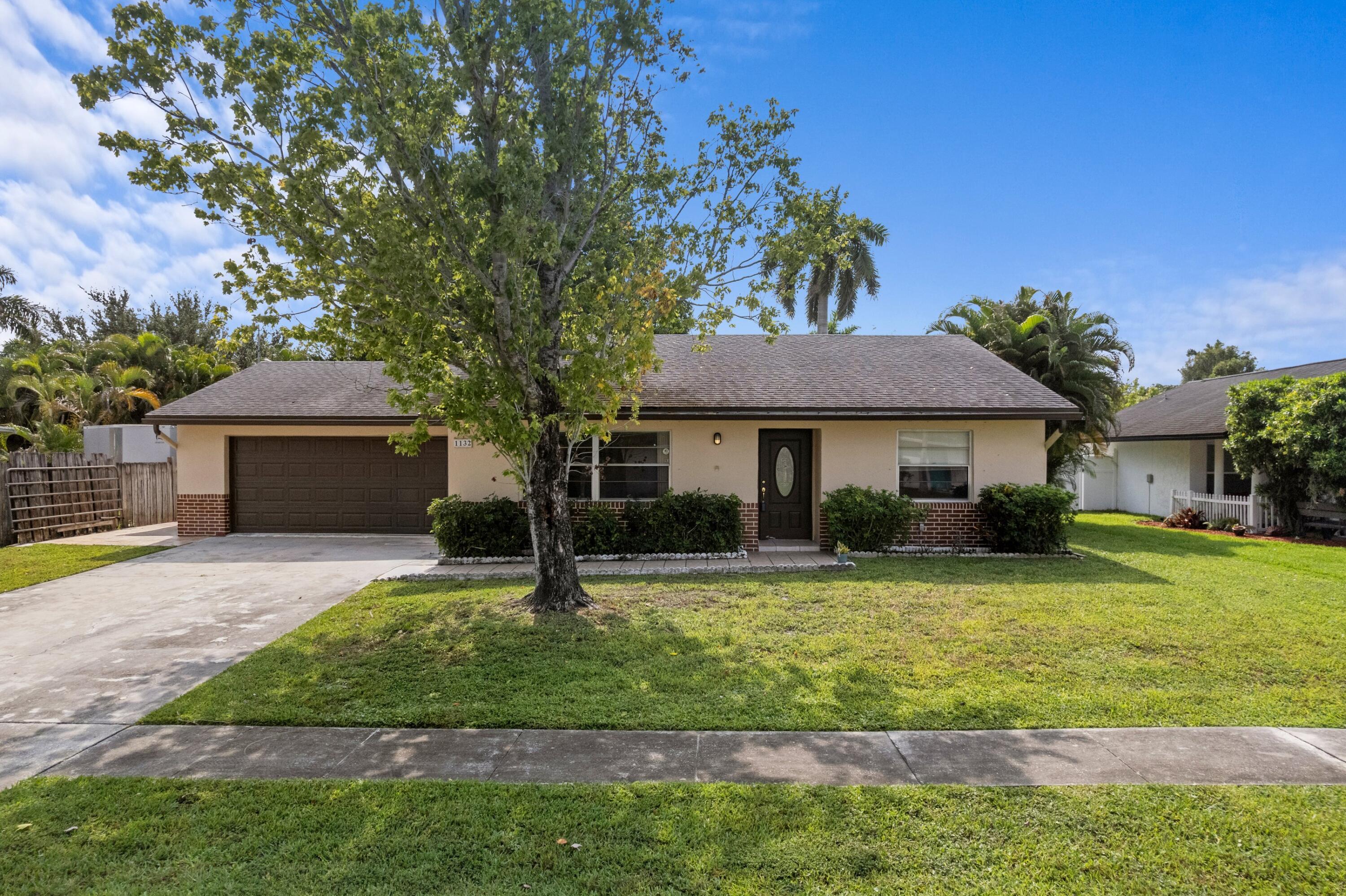 Here's your chance to own one of the largest homes on one of the largest lots in the area.  Plus the yard is fenced and includes a shed.  Large eat-in kitchen has "Granite" counters and backsplash, stainless-steel appliances.  Oversized 2-1/2 car garage has pull-down stairs with attic storage and built-in closets, and 4-car driveway.  Covered and tiled patio.  Separate living and family and formal dining rooms.  All rooms are large.  Tiled throughout, no carpet.  No HOA fees or rules.  Complete storm panels.  Newer exterior paint.  Newer water heater.  Auto-sprinklers on a well.  Sidewalks and street lighting.