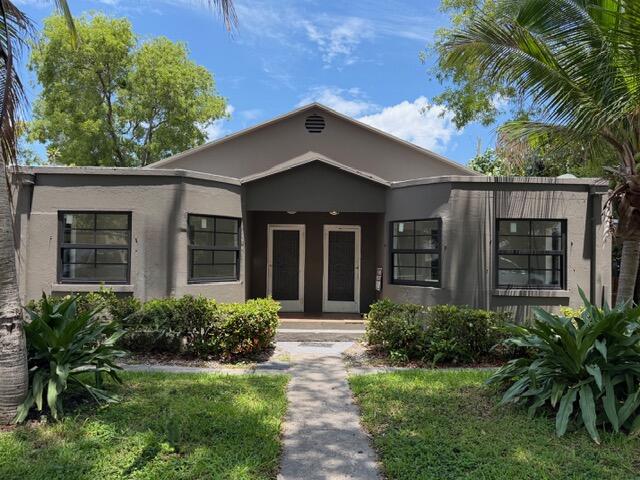 Turnkey triplex just one block from the Intracoastal offering an incredible investment opportunity in a prime South Florida location. Freshly painted inside and out with new flooring throughout, updated kitchens and bathrooms, and hurricane impact windows for added value and peace of mind. New A/C units. Clean modern interiors with spacious layouts make this property truly move in ready and ideal for immediate rental income. Perfect for investors looking for a low maintenance property with strong income potential or an owner occupant seeking a house hack opportunity. Conveniently located near downtown, beaches, shopping, dining, and waterfront activities. Front duplex can be made into 2/1s. A rare opportunity to own a fully updated multi family property in a rapidly growing coastal area.