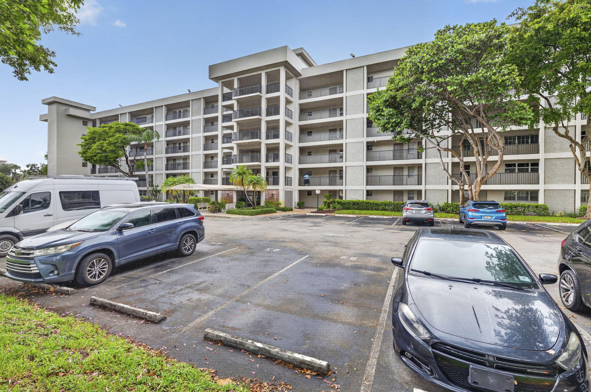 Welcome to Palm-Aire Country Club! This spacious 2-bedroom, 2-bath condominium offers approximately 1,100 square feet of living space and is conveniently located on the ground floor. This well-preserved unit features tile flooring throughout, a split-bedroom layout, and easy access without stairs or elevators. A fantastic opportunity to update and personalize at your own pace while enjoying the Palm-Aire lifestyle with nearby golf courses, parks, and walking paths. Ideally located across from Harrah's Casino, Topgolf, restaurants, and the growing entertainment district. Minutes from beaches, shopping, dining, and major highways, while benefiting from the continued redevelopment transforming Pompano Beach.