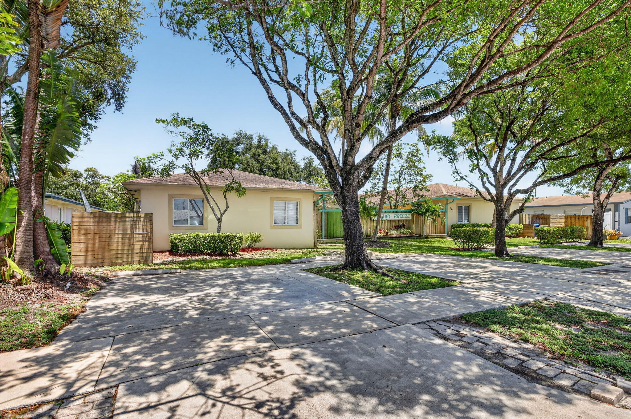Welcome to your high-yield, fully managed investment opportunity in the heart of Croissant Park, just minutes to the vibrant lifestyle of downtown's Las Olas blvd and Fort Lauderdale's world class beaches. 301 & 305 SW 16th St are being sold in tandem delivering a powerhouse portfolio of 2 lots, with a total of 4 units. Each unit features a spacious 3/2 split floor plan with open living & dining area, full kitchen & laundry. Meticulously designed and fully optimized for specialized group housing, currently serving as a high-demand short-term hub for yachting crew members. Whether you are looking to continue the lucrative crew housing model or pivot to a specialized residential facility, the infrastructure is already in place making this a truly turnkey investment operation from day one. What truly sets these units apart are the size of the units providing oversized bedrooms allowing for exceptional comfort and flexibility. The master bedroom in each unit easily accommodates a king-size bed and has its own ensuite bath, while the two additional large bedrooms have spacious closets and offer versatile configurations perfect for either a king bed or two twin beds depending on your needs. There is plenty of room to relax in the open living room / dining room combo which separates the master from the remaining 2 bedrooms. The full sized kitchens and laundry in each unit is a real convenience for its residents.  Enclosed by a full privacy fence, this property serves as a secure haven for residents and a high-performance asset for investors. This is a rare "plug-and-play" opportunity, currently under full professional management and perfectly positioned for someone seeking a completely passive income stream. For the more hands-on owner, the flexibility remains to transition to self-management and take the reins directly. The location is unbeatable for the maritime industry, featuring dedicated off-street parking—a premium commodity in this area—and interior configurations that maximize both utility and privacy. With 12 total bedrooms across the two buildings, the scale offers a level of cash-flow potential that is increasingly difficult to find in the 33315 zip code. If you're looking for a turn-key, high-yield investment with a proven niche and management already in place, this is it.