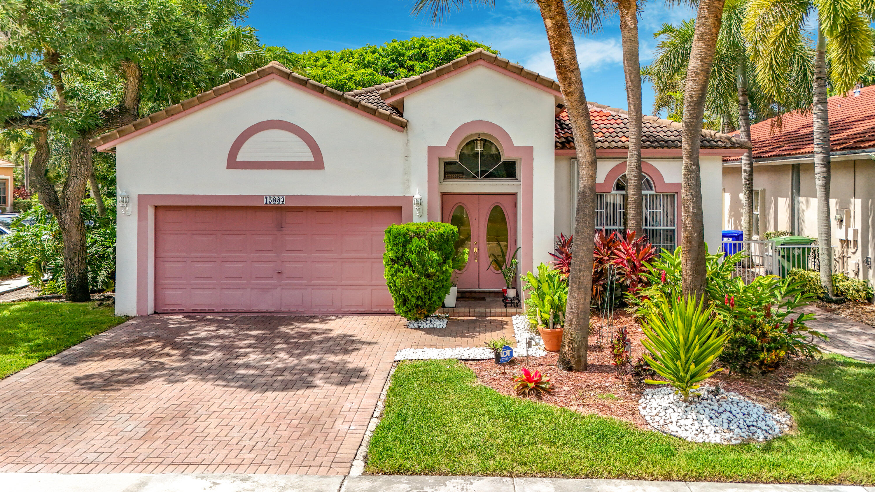 Priced to Sell! Welcome to the exclusive Mediterranean-inspired community of Grand Palms, in the heart of West Pembroke Pines, a premier gated golf course community. This beautifully maintained 3-bedroom, 2-bath residence features a spacious functional floor plan with generous living areas, abundant natural light, and a 2-car garage, offering the perfect blend of comfort and everyday convenience. Located in one of the area's most sought-after neighborhoods, residents enjoy access to A-rated schools and exceptional HOA amenities.   Some images have been virtually staged or digitally enhanced for marketing purposes.