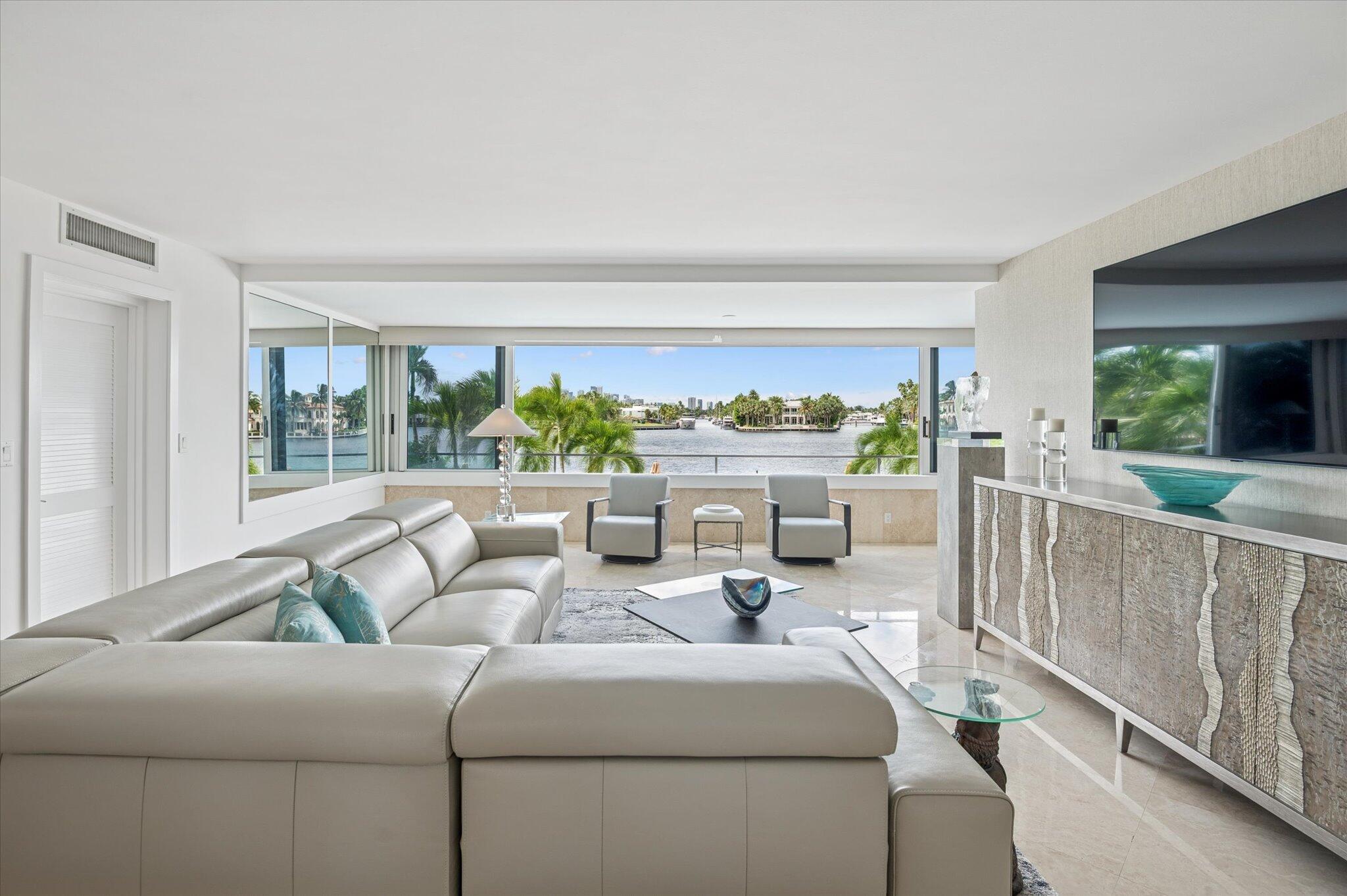 Incredible direct Intracoastal views only a few feet away from your wall to wall slider windows; magnificent day or night. Tastefully furnished with a new kitchen, this spacious corner unit offers abundant light. Marble floors, with carpet in the bedroom, quartz counters and a washer and dryer. The Versailles is a boutique-sized building only a couple of blocks to the Beach. There is so much to do in Fort Lauderdale. Catch the water-taxi on the next street, dine out in one of the many highly rated restaurants close-by or along Las Olas Blvd.  What a location and again, the views are amazing.