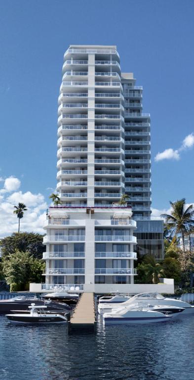 Introducing Alba Palm Beach, a boutique offering of 55 residences located directly on the intracoastal. This 18th floor 3 bedroom 3.5 bathroom residence has southeast exposure awarding sweeping views of the intracoastal, Palm Beach, and the Atlantic Ocean. With just 4 residences per floor, 1102 has a private keyed elevator that enters directly into a private vestibule before entering the home. The open concept floor plan features custom Italian cabinetry and a SubZero and Wolf appliance package in the kitchen, floor-to-ceiling impact windows and sliders throughout, and a 556 SF terrace with a summer kitchen allowing for true indoor-outdoor living. Intimately sized, and graciously appointed Alba features 2 to 4+ bedroom residences ranging from 1,770 SF to over 4,500 SF. Distinguished by a private dock with direct Intracoastal access and no fixed bridges, Alba also features 25,000 SF of exclusive amenities, as well proximity to world-class shopping and dining.