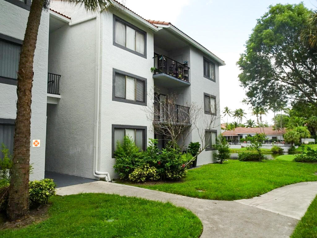 Enjoy waterfront living in this 2/2 first floor unit at gated Visconti Condo. Freshly painted. Open concept floor plan. Split bedroom layout. Primary suite with walk-in closet and ensuite bath. Interior laundry equipped with w/d hook-ups. Relax on the covered patio overlooking tranquil lake and fountain views. Private storage closet for added convenience. Ideally situated close to community amenities: clubhouse, swimming pool, tennis court and playground. Immediate rental twice per year makes this an excellent opportunity for homeowners and investors alike. Small pets welcome. Conveniently located across from Coral Square Mall and minutes to shopping, dining, parks, schools, bus routes and thoroughfares.