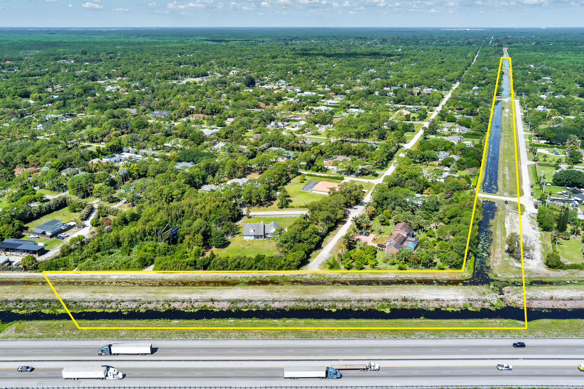 Rare opportunity to own approximately 13 acres of vacant land in a highly desirable area with AG-RES zoning. This unique parcel offers potential while still maintaining convenient access to surrounding amenities. A portion of the property runs along the Florida Turnpike, creating a distinctive footprint and exceptional exposure. Properties of this size and character are becoming increasingly difficult to find in the area. Vacant land — buyers agents and prospective buyers may walk the property during daylight hours at their own discretion and risk. Please use caution while on the site and do not access unsafe or restricted areas. Don't miss the chance to secure one-of-a-kind acreage with possibilities.