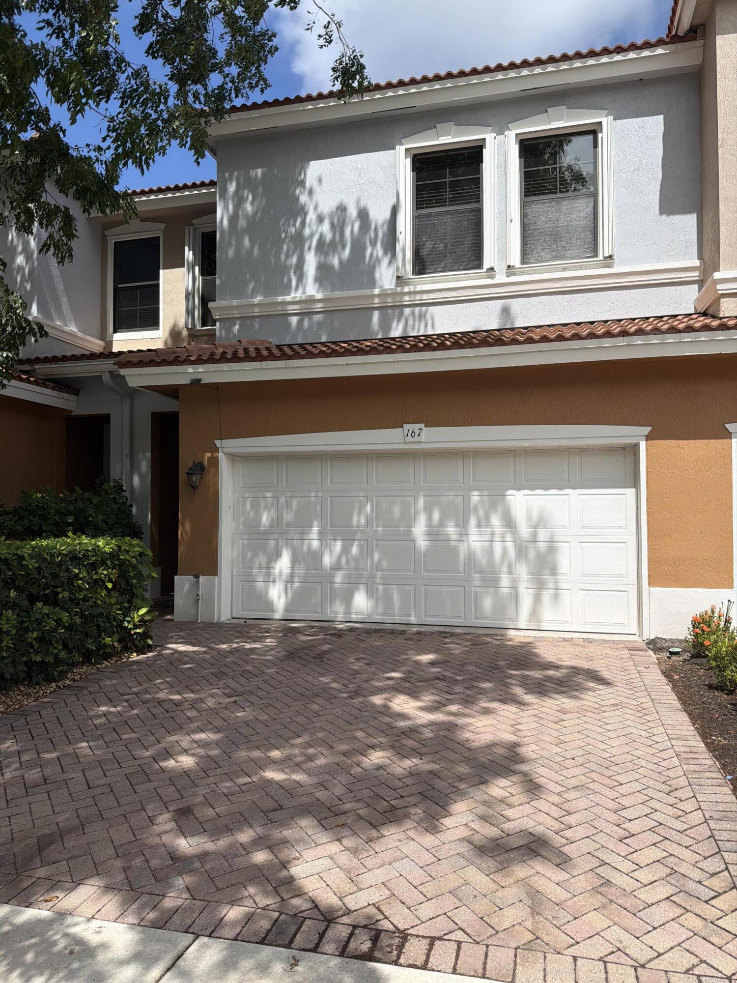 Welcome to 167 Gramercy Square Drive, a beautifully maintained 3 bedroom, 2.5 bath townhome with a 2 car garage and peaceful water views in the heart of Delray Beach. This spacious home offers a bright, open layout with generous living and dining areas, ideal for everyday living and entertaining. The kitchen flows comfortably into the main living space, creating an easy, functional feel throughout the first floor. Upstairs, the primary suite offers a relaxing retreat with an en suite bath, while two additional bedrooms provide flexibility for guests, or a home office. The second floor laundry adds everyday convenience.