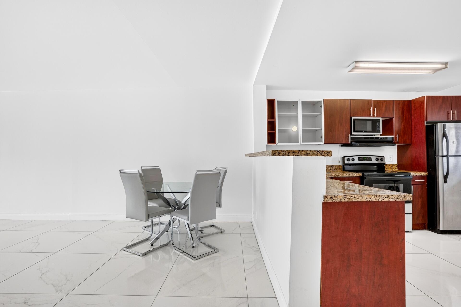 Fabulous first floor 2 bedroom 2 bath condo on the water. Located in the boutique community of Pompano Beach View.  So convenient with parking right outside your front door and the pool right outside the back door. Serene water views, updated kitchen with newer appliances, renovated baths and there is a full size washer and dryer. Great location within a couple of miles of the beach and close to major highways. Can rent immediately up to 4 x/year. Whether using as a primary residence or a vacation home, this is a great value.