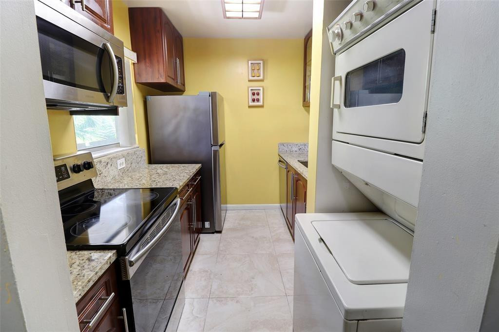 THIS SPACIOUS UPGRADED 2 BEDROOM- 2 BATHROOM CONDO OFFERS AN UPDATED KITCHEN, NEWER APPLIANCES, AND AN IN UNIT WASHER & DRYER. CENTRALLT LOCATED IN THE HEART OF CORAL SPRINGS, NEXT TO SHOPPING, DINING AND TRANSPORTATION. FOR YOUR FIRST HOME OR FOR A FAMILY THIS CONDO IS READY FOR ITS NEXT OWNER.