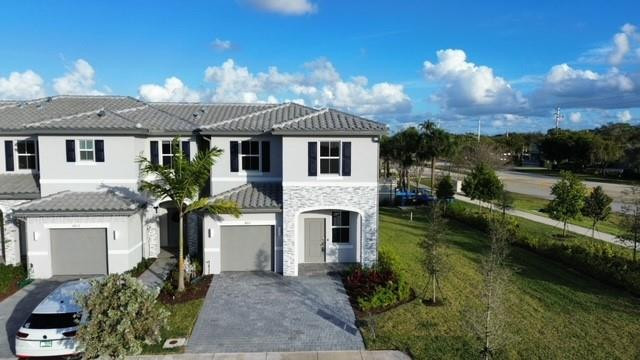 Beautiful New Townhome, built in 2023, offering the perfect combination of style and functionality. The first floor features: title flooring Impact-resistant windows for safety and comfort, fully equipped kitchen a beautiful island, Spacious living and dining areas, Half bathroom. Garage in fenced backyard finished with stones and artificial grass. The second floor offers: 3 bedrooms, including a master suite 2 bathrooms The gated community offers, Low association fees A beautiful 3 km walking trail surrounded by lush gardens, perfect for a healthier lifestyle. Close to top-rated schools. Driving Directions Association required $ 1000 deposit.