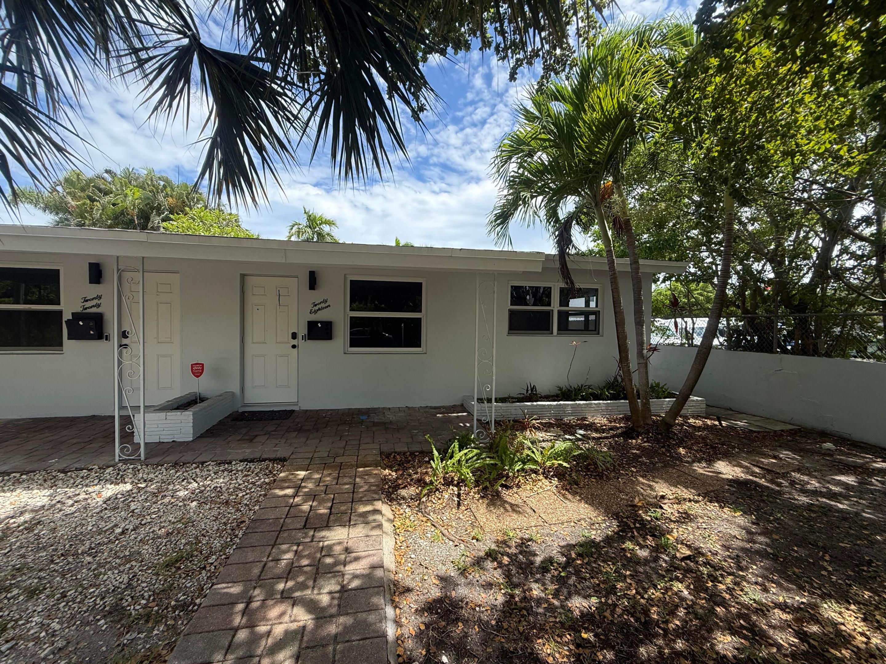 Completely remodeled and move-in ready, this exceptional waterfront residence offers the perfect blend of luxury, convenience, and boating access. Recent upgrades include a new roof, new AC systems, new interior and exterior paint, and new appliances, providing peace of mind for years to come.  Nestled on a private, quiet dead-end street, the property features a newly constructed dock with flexible docking options, offering approximately 30 feet of dockage on either side or up to 60 feet if both sides are utilized. Boaters will appreciate the easy ocean access with only one fixed bridge (approximately 11' clearance) and a short 4.5-mile boat ride to the Atlantic Ocean.  The outdoor living area enjoys a lushly landscaped, secluded backyard setting, creating a peaceful retreat for relaxation and entertaining. Conveniently located within walking distance of upscale shopping, dining, and everyday conveniences, this home combines a desirable waterfront lifestyle with exceptional accessibility.  A rare opportunity to enjoy updated waterfront living in a highly sought-after location. DOCK AVAILABLE AT 15$ A FOOT. NOT INCLUDED.