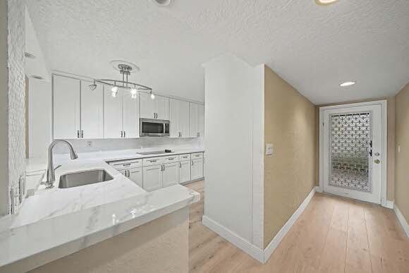 WATERSEDGE AT LAKES OF DELRAY CONDO A THRU H DE - Residential