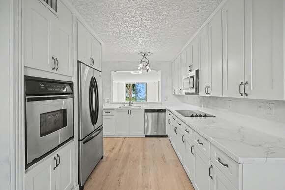 WATERSEDGE AT LAKES OF DELRAY CONDO A THRU H DE - Residential