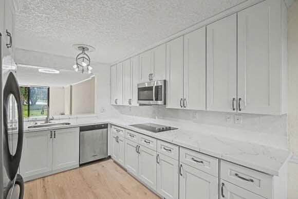 WATERSEDGE AT LAKES OF DELRAY CONDO A THRU H DE - Residential