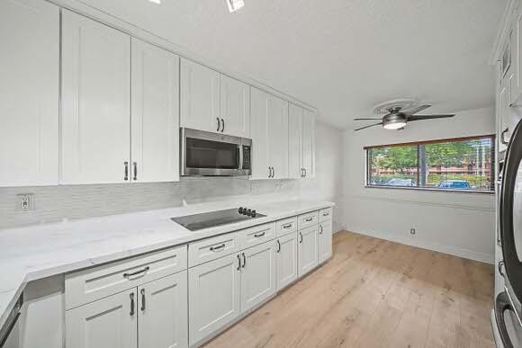WATERSEDGE AT LAKES OF DELRAY CONDO A THRU H DE - Residential