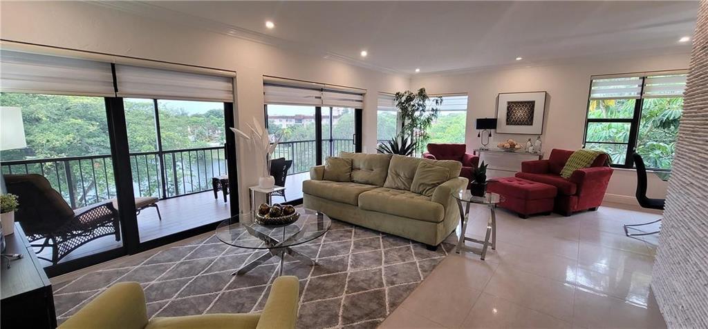 Discover this Charming 3-Bedroom, 2-Bathroom Condominium Located in the Gated Community of The Falls of Inverrary in Lauderhill, FL. This Well-proportioned Unit Spans 1,370 sq ft of Finished Living Space Offering an Efficient Layout that Maximizes Comfort and Functionality. Beautiful Garden Views from the expansive Balcony and Bedrooms, Impact Windows add Energy Efficiency and Security. Garage parking and 2 guest spots. Association Requires min 700 Credit Score and Income of $70k. Potential for FHA Financing.