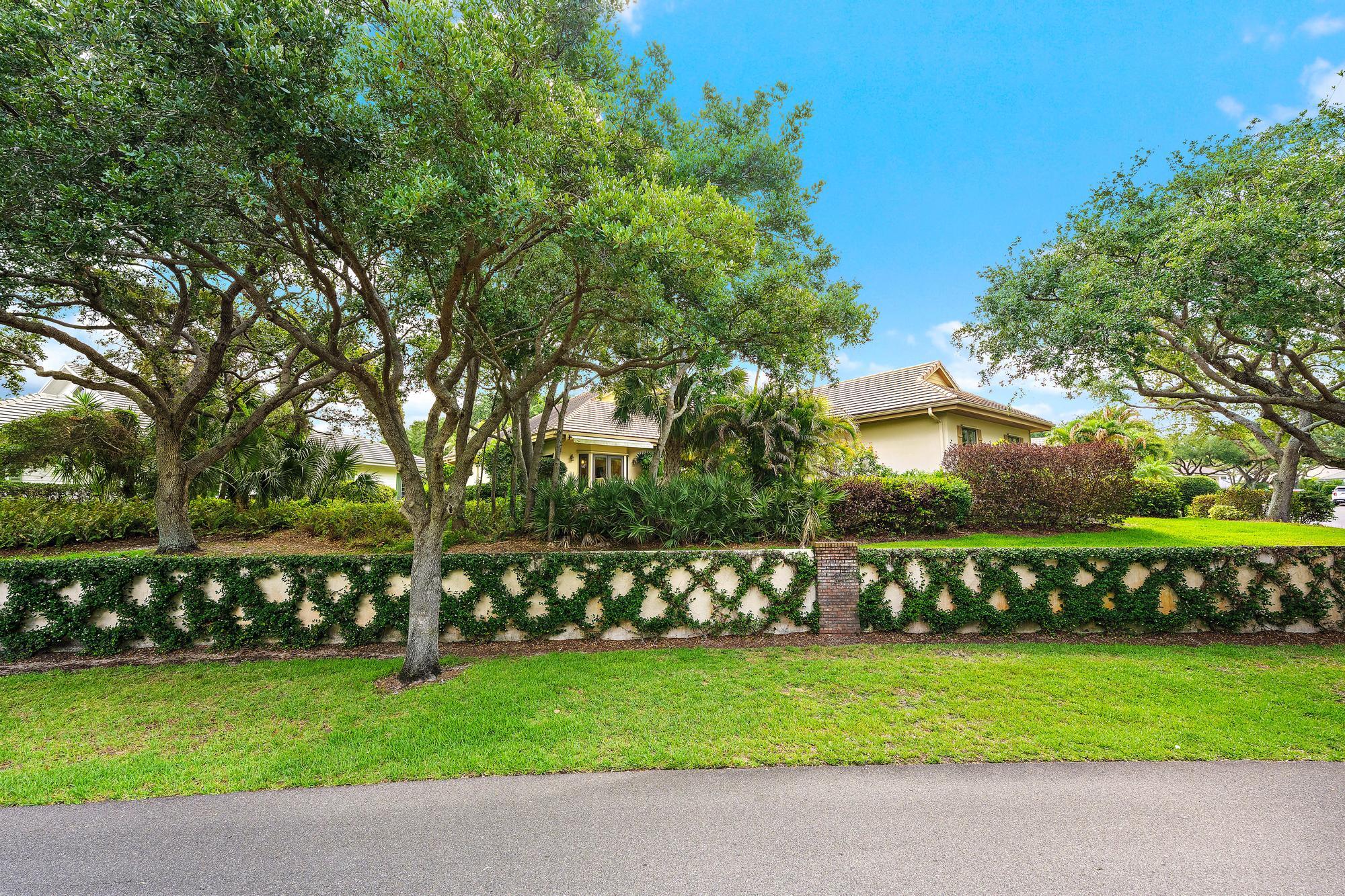 This Lovely Jupiter Hills home with rare private guest cottage affording you the luxury of entertaining guests for a weekend of golf, sunbathing and entertainment with the privilege of housing your friends in their own private guest cottage. What a special extra!  This village home sits at the top of Prestwick peak high above everything. With an oversized detached two car garage to keep your vehicles safe from the elements and a covered entry to keep you dry on those rare days when it may rain. If you are looking for a home in Jupiter Hills this may just be the one. Come decide for yourself. This tasteful Jupiter Hills village home lives like an estate home with private cottage but easy to maintain.