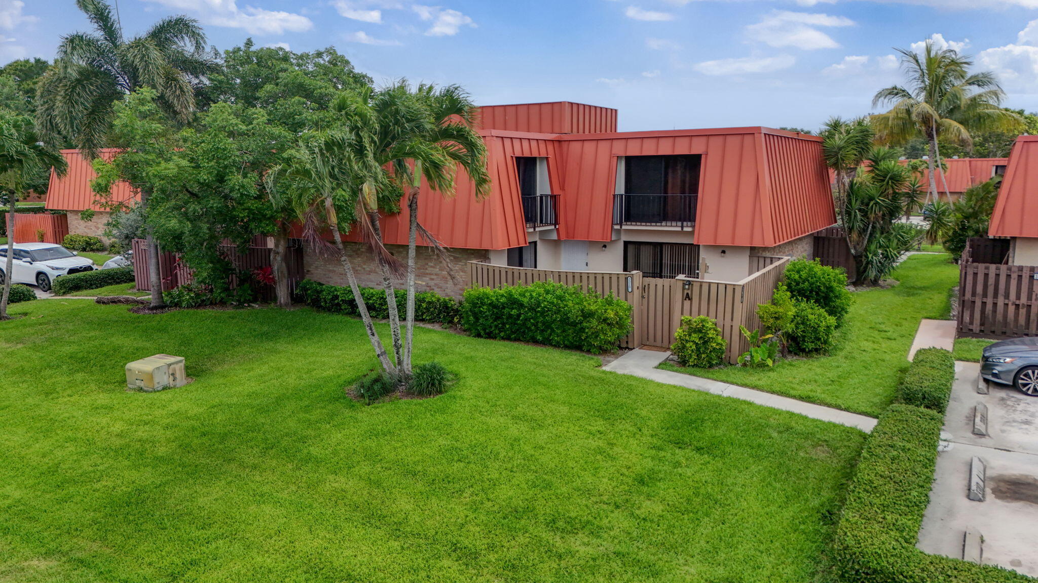 Located in the heart of Palm Beach Gardens, this updated 2-bedroom, 2-bath residence is just minutes from The Gardens Mall, dining, shopping, and top-rated Palm Beach County schools. Recent kitchen renovations include quartz countertops, tile backsplash, updated fixtures, and SS appliances. Both bathrooms have been remodeled with floor-to-ceiling tile surrounds and modern illuminated mirrors. Tile flooring runs throughout with no carpet. Additional updates include a gas dryer, water heater, and privacy fence surrounding the courtyard. Low HOA of $282/month includes basic cable and hurricane insurance. Convenient location with easy access to everything Palm Beach Gardens has to offer.