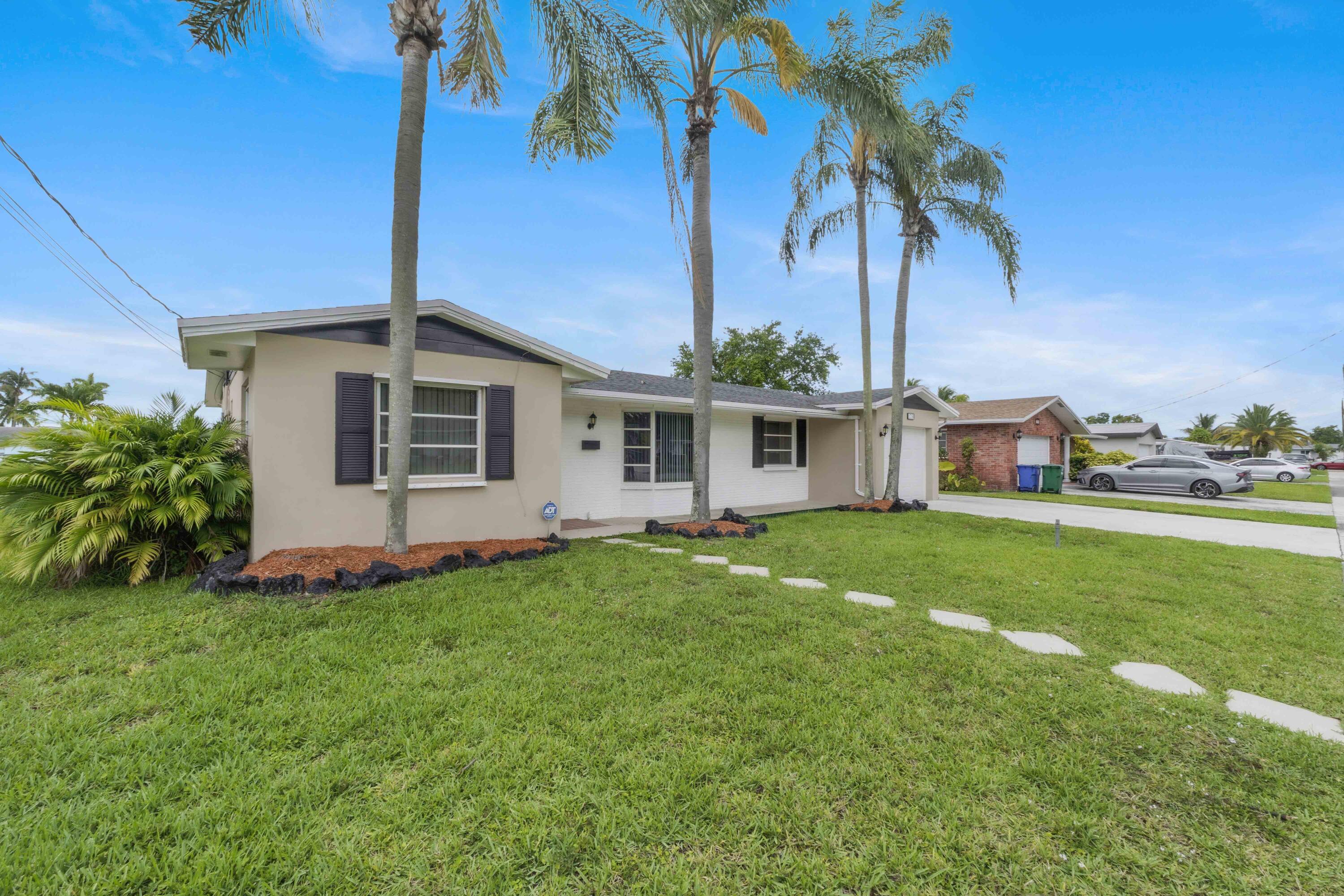 Well Maintained & Loved 3 Bedroom plus Den, 2 Bathroom Pool Home on the Stanahan River! Kayak, Canoe or SUP your way through the Margate canal to the C-14 Canal. Great Home with Flexible Floor Plan perfect for Multi-Generational Living or Working from Home. Oversized Screened Patio & Pool complete with a Covered Roof area to escape the sun. Pocket Sliding Doors from Family Room & Primary Bedroom open to the Patio for outdoor living. Kitchen offers a Pass Through Window to Patio. Den has a separate entry to the garage. Split Stack Bedroom Plan. Luxury Vinyl Plank Flooring in 3 Bedrooms & Den installed last year. Neutral Tile throughout the Living Area.  Primary Suite offers walk-in-closet & Ensuite Bath (cabana bath).  A/C, Refrigerator & Electrical Panel (outside) are newer.   Water Heater & Washer/Dryer 2 years New. Sprinkler Pump & Pool Pump approx. 2 years New. Exterior Freshly Painted. Hurricane Panels, Complete Set, located in Garage. Newer Garage Door, is Hurricane Rated, complete with 2 Remotes.  $10,000 Concrete Driveway accommodates 5 Cars. Motion Detector Lighting on South side of Home and Front Lighting on Dusk to Dawn. No HOA! Original owner was the builder for the area. Parking for Boats, RV's and Working Vehicles is permitted. Walking Distance to Margate Elementary, an A Rated School. Access to 441 via Walking Bridge at NW 18th St. Legacy Park is less than 1 mile away and features a boat ramp to launch a Kayak or Canoe.