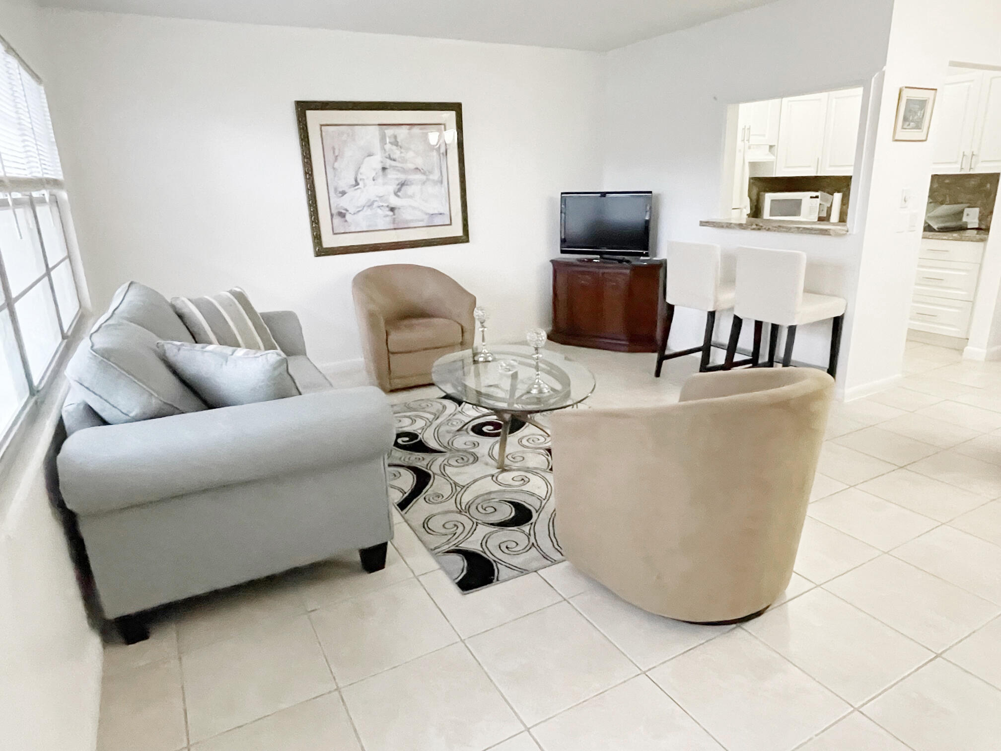 For annual rent, furnished or unfurnished in gated Century Village, a 55+ age restricted community in Boca Raton, this BRIGHT apartment, offers a great location, and the amenities of a clubhouse, theater, heated pool, tennis, and lots of activities through the whole year.