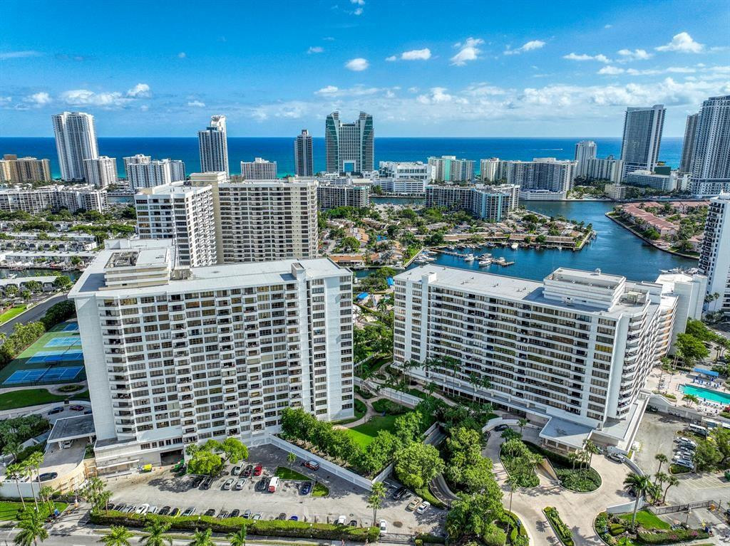 Welcome to Olympus Condo in Hallandale! This 1,000sf spacious 1 bedroom, 1.5 bath unit has tons of storage and a beautiful balcony. Resort style amenities include 2 pools, spa/hot tub, fitness center, 5 tennis courts, BBQ area, bike storage, library, extra storage for each unit, a parking space for the unit inside the garage. The HOA's 40 year assessment has been paid and the new windows insurance assessment has also been paid. HOA now includes free internet! The information has been provided by the Seller and public records and has not been verified by the Broker. Information is deemed reliable but not guaranteed.