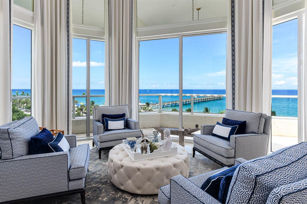 Stunning ocean-to-Intracoastal 4BR/4.1BA plus den Bellaria penthouse. Featuring 7,400 +/- total square feet and water views from all major rooms. Elevator opens to private entry vestibule. Oceanfront living room with soaring ~14' ceilings, marble flooring, and beautiful built-ins opens to large balcony. Formal dining room leads to oversized terrace overlooking the Intracoastal waterway. Master suite with ocean views, dual walk-in closets, and large bath with shower, soaking tub, and dual sinks and powder rooms. Gourmet kitchen with top-of-the-line appliances, granite counters and backsplash, chef's island, and breakfast bar. Enjoy sunrises and sunsets from this stunning condo. Full service condominium with exercise room, full time manager, theater room, and oceanfront pool and spas.