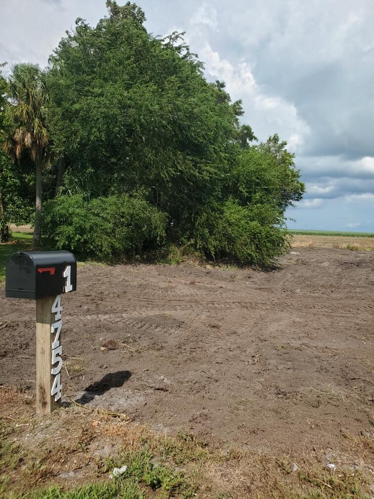 SPECTACULAR OPPORTUNITY! EXCELLENT LOCATION!  This half-acre (0.51 Acres) property consists of three lots, offering an exceptional canvas. Location is a major highlight for outdoor lovers; the parcel sits directly across from the Lake Okeechobee Scenic Trail and just down the road from the Canal Point boat ramp, placing boating, fishing, hiking, and biking right at your doorstep. HIGHEST AND BEST OFFER! BUYER TO DO THEIR DUE DILIGENCE!