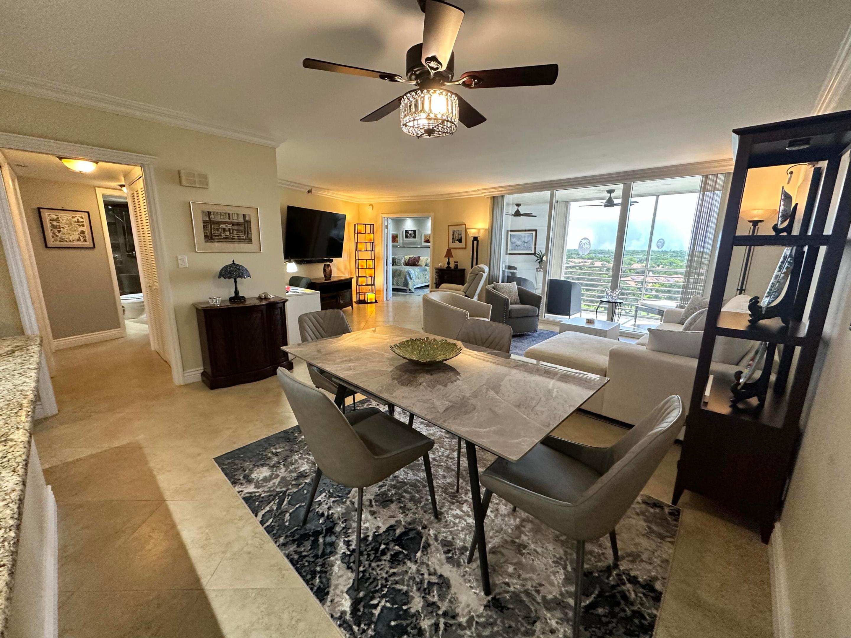 King Model, the largest 2-bedroom, 2-bath floor plan in Palm Aire, offering approximately 1,200 sq ft of beautifully remodeled living space. This move-in ready residence features impact windows, an in-unit washer and dryer, stainless steel appliances, and a spacious open layout. Enjoy one of the community's best golf course views from the oversized primary suite and large private balcony. The building has no special assessments for added peace of mind. Conveniently located near shopping, dining, major highways, casinos, and the beach. No mandatory golf membership required.
