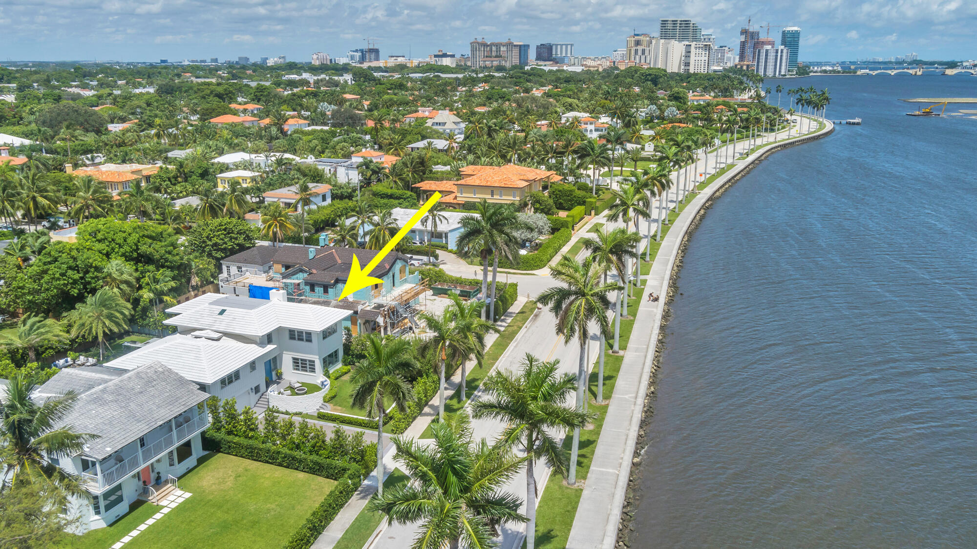 Just Completed on South Flagler Drive in the very sought-after Historic West Palm Beach. This mid-century home was completely renovated and expanded by Ritzzo Development and designed by Mizner award-winning FGS Design. While historic, the cedar paneled home is brand new featuring 3,908 square feet, 4 bedrooms, and 5.1 baths. While retaining its '60s glamour, the house features all of today's modern conveniences and design preferences by HW interiors, including real terrazzo tile and engineered hardwood floors throughout, an open kitchen with Thermador appliances, full Crestron home system lighting and music, and smart home technology. Corner windows in the living room and primary bedroom suite with marble master bathroom showcase waterfront views. Enjoy the resort-style outdoor space with lush landscaping by Environment Design Group, a built-in BBQ, custom stone pavers, a cabana bathroom, and a beautiful custom pool.