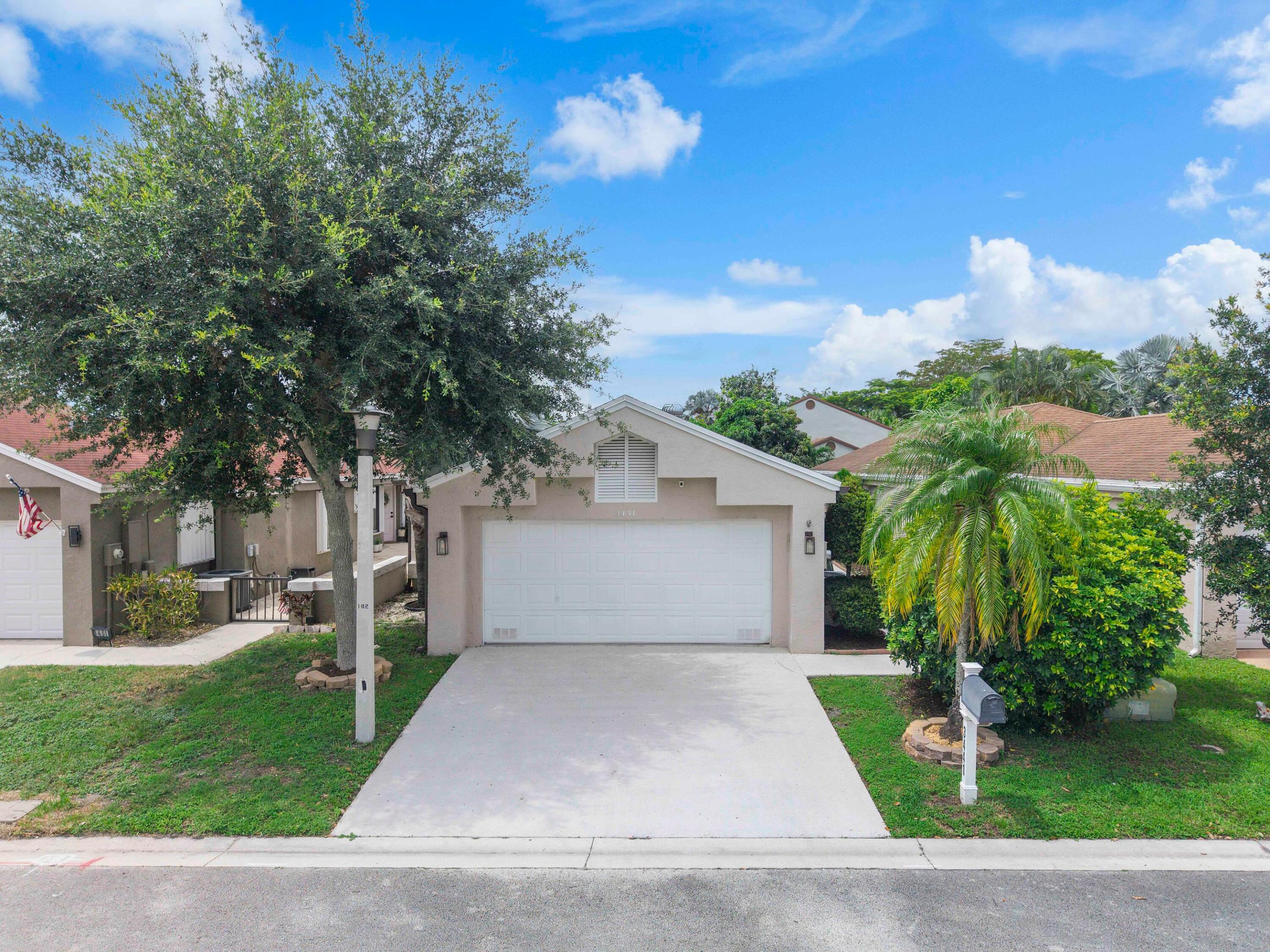 Beautifully Updated 3/2 in Gated Coconut Creek Community. Step inside to elegant marble floors, a tastefully updated kitchen, and a layout built for easy Florida living. Out back, a true outdoor kitchen and fenced yard create the ultimate space for entertaining. Impact windows and a 2018 roof deliver lasting peace of mind. A rare community perk: dedicated owner parking for commercial vehicles, boats, and RVs. Resort-style amenities include pool, clubhouse, tennis, basketball, playground, fitness center, and a rentable community room perfect for gatherings. All within a secure gated setting, minutes to major highways, shopping, and dining. Schedule your showing today.