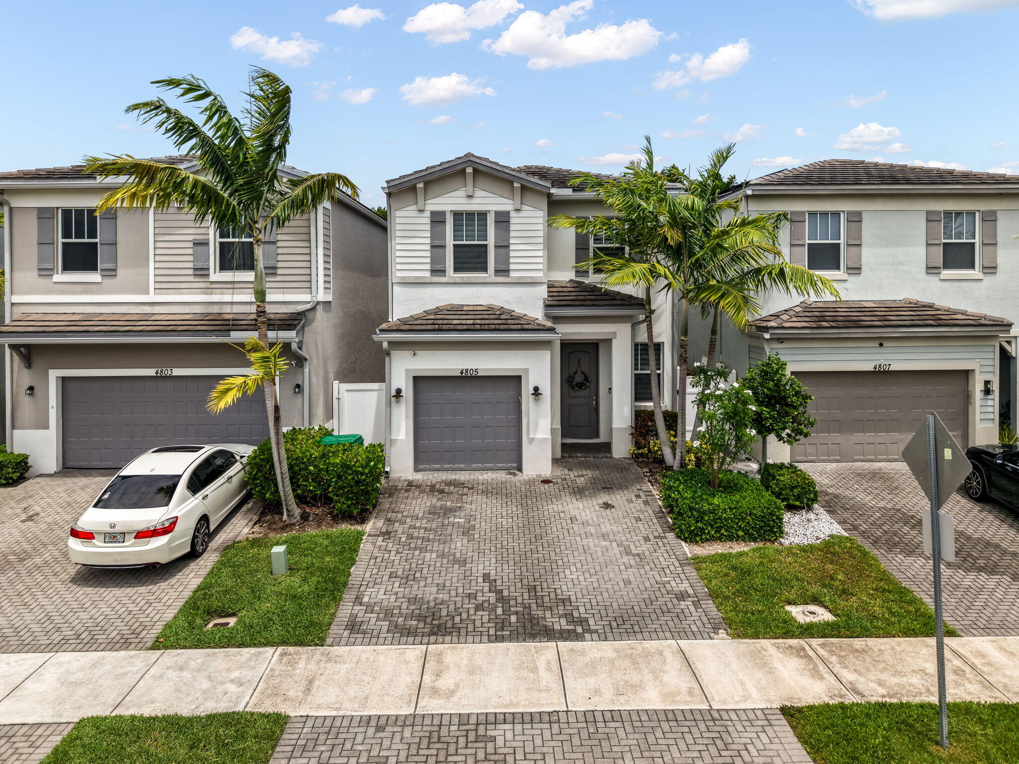 Built in 2019, this beautifully maintained home offers the perfect combination of modern construction, convenience, and affordability. Featuring complete impact windows and doors for added storm protection and peace of mind, this move-in-ready residence is located in a desirable community with an HOA of only $51 per month. Enjoy ample parking with a garage and driveway space for two additional vehicles. Ideally situated just minutes from the Florida Turnpike, this home provides easy access to commuting, shopping, dining, and entertainment throughout South Florida. Don't miss the opportunity to own a newer construction home with low HOA fees, modern features, and an unbeatable location.