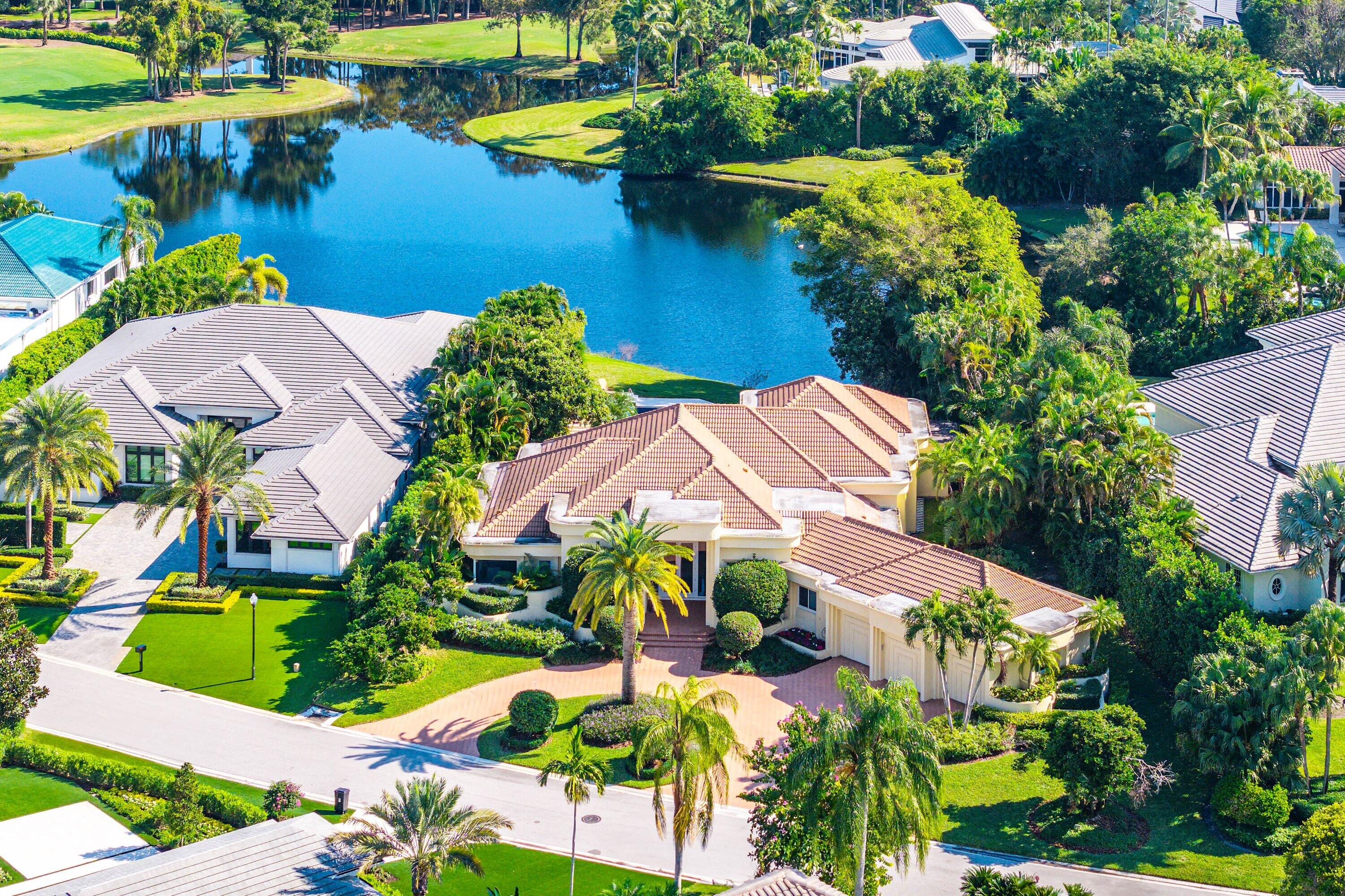 Exquisite single-story residence in the  prestigious community of Frenchman's Creek offering 3 bedrooms plus an office, 5.5 bathroom and over 4200 sf of living space. Set on half an acre of private land, this home enjoys sweeping lake views that serve as a serene backdrop from nearly every room.

Be impressed by the thoughtful, open concept floor plan, each space is designed to maximize the breathtaking vistas. A wall of expansive windows along the rear reveals natural light and creates an airy ambiance, ideal for everyday living and effortless entertaining.

The spacious primary suite features two custom walk-in closets and dual primary bathrooms. Embrace Florida's Indoor/outdoor lifestyle as you step through as you step through a full wall of sliders onto the large covered patio and additional screened area, complete with a summer kitchen. The modern pool and spa overlook the sparkling lake, accompanied by a separate cabana bathroom for added convenience. There is also ample green space to enjoy the outdoors. 

Some other exciting features with this home include a 3 car garage, full impact glass, a newer roof and newer AC units - providing comfort and peace of mind. Don't miss this exceptional opportunity. Schedule your private showing today!

Frenchman's Creek Members enjoy the ultimate concierge lifestyle with resort amenities, state-of-the-art brand new clubhouse, two 18-hole championship golf courses - for only 600 homes. Numerous dining options, navigable waterways, racquet sports, social events and so much more. The exclusive Beach Club, included with membership, located on beautiful Juno Beach allows use of pool, restaurant, beach attendant and water activities.