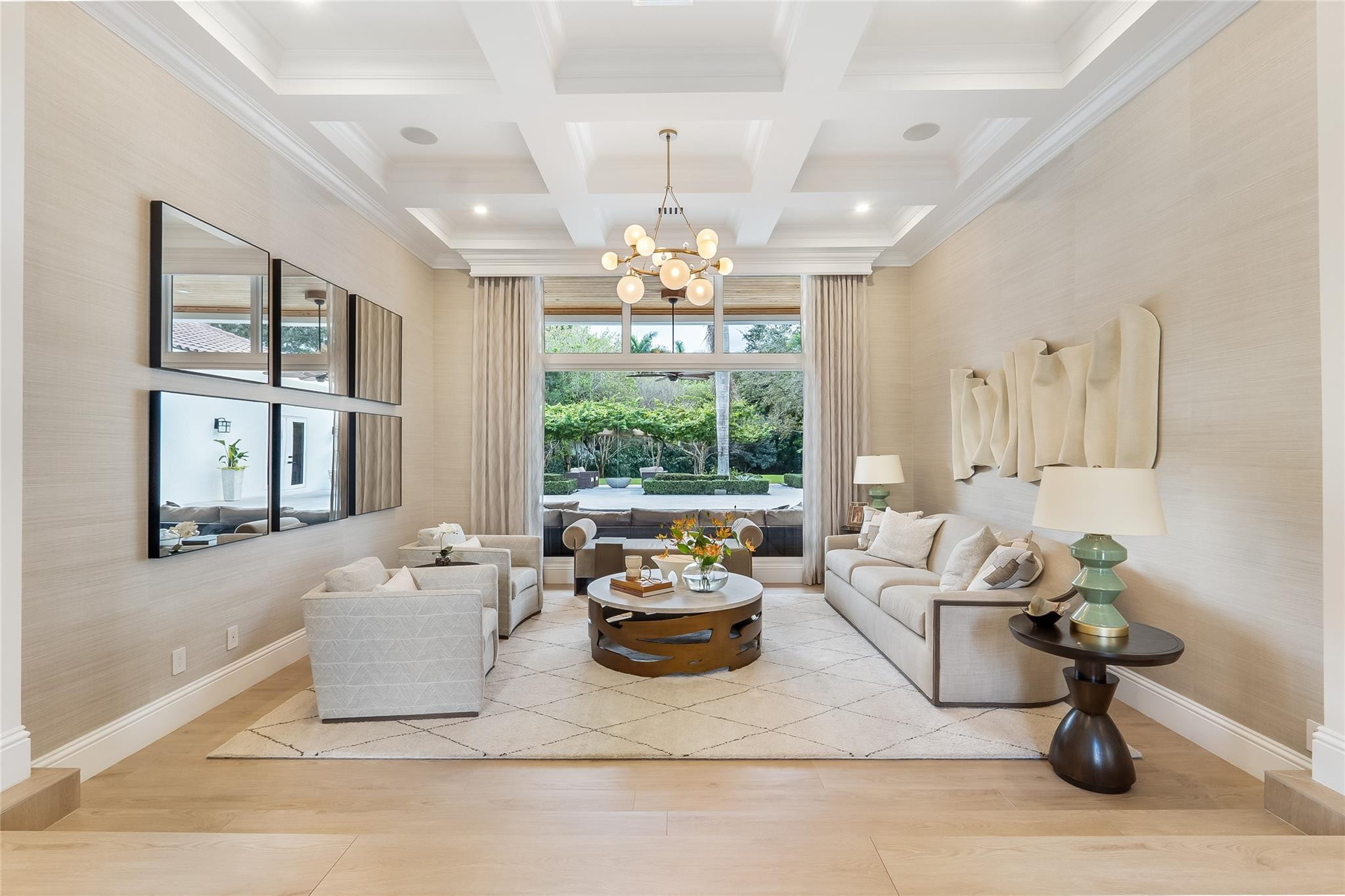 A Home Designed to Be Felt, Not Just Seen! Being sold fully furnished, Turn Key! Perfectly positioned and extensively renovated estate offers a rare combination of luxury, comfort, privacy, and modern convenience. Bathed in natural light through expansive impact windows and doors, the home showcases breathtaking views of manicured grounds and a resort-style heated saltwater pool. Every detail has been thoughtfully reimagined, from the designer lighting to the custom architectural finishes that create an atmosphere of timeless elegance. This is one of the most extraordinary opportunities in Windmill Ranch Estates. Nestled on approximately 1.37 private acres, this extensively renovated estate has been thoughtfully reimagined to deliver an unparalleled luxury lifestyle where every detail has already been considered. A grand arrival begins with an expanded brick-paver driveway, lush professional landscaping, custom impact front entry, and elegant exterior lighting. Inside, natural light pours through impact windows and doors, smooth-finish ceilings, designer lighting, custom window treatments, and beautifully reconfigured living spaces designed for both comfort and sophistication. The spectacular chef's kitchen serves as the heart of the home, featuring a Wolf 8-burner gas range, Thermador refrigerator and freezer columns, Bosch dishwasher, microwave drawer, custom cabinetry, handcrafted plaster hood, pot filler, and Zip Water system providing filtered, boiling or chilled water on demand. Designed for effortless entertaining, the family room and game room showcase custom built-ins, Samsung Frame TVs, a designer entertaining bar, Thermador refrigerator drawers, white oak architectural details, and multiple gathering spaces. The luxurious primary retreat offers custom cabinetry, designer finishes, spa-inspired dual baths with NEOREST TOTO smart toilets, steam system, custom dressing areas, and dedicated Trane climate control. Smart-home features include Control4 whole-home audio, enterprise-grade Aruba Wi-Fi, whole-house water filtration, 10-camera security system, RainBird smart irrigation, new Trane A/C systems, updated water heaters, and extensive infrastructure improvements. Outside, enjoy a heated saltwater pool, summer kitchen, guest house, upgraded outdoor living spaces, and resort-style grounds that create an atmosphere of privacy, relaxation, and effortless luxury. Rarely does a home combine this level of design, craftsmanship, technology, and lifestyle. This is more than a residence, it is one of Weston's most compelling luxury estates.
