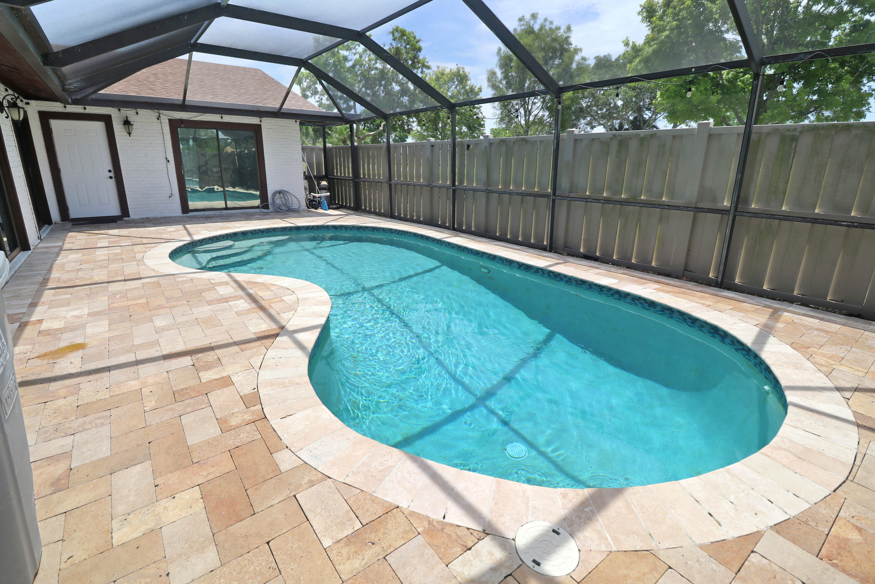 Welcome to this charming three-bedroom, three-and-a-half-bath townhouse located in Boca Gardens, Boca Raton. This well-designed two-story residence offers 1,325 square feet of finished living space, providing comfortable accommodations and functional layout. The property features a single-car garage, adding convenience for vehicle storage and protection. With its thoughtful floor plan spread across two levels, this townhouse presents an efficient use of space ideal for those seeking a low-maintenance residence in an established community.