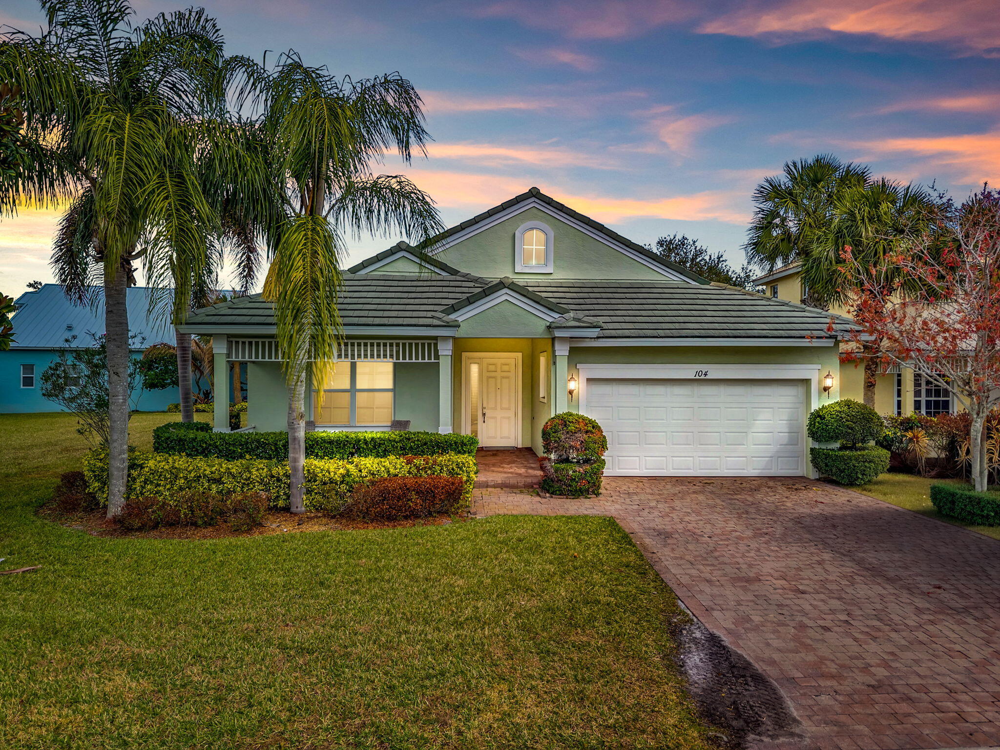 Beautifully renovated 3-bedroom, 2-bath home with a 2-car garage, ideally situated on a corner lot with tranquil lake views. This home was completely remodeled in 2015, including walls, electrical, plumbing, kitchen, bathrooms--everything has been thoughtfully updated. The bright, open kitchen features white cabinetry, granite countertops, and a clean, modern design perfect for everyday living and entertaining. The spacious primary suite offers two closets and a well-appointed bathroom with separate shower and soaking tub. Enjoy both formal living and family rooms, with the family room featuring a wall-mounted large flat-screen TV. Outdoor living is enhanced by two screened patios overlooking the lake, providing peaceful water views and ideal spaces to relax.  Conveniently located near the main gate and resort-style clubhouse, residents enjoy exceptional amenities including adult and children's swimming pools, tennis courts, basketball court, bocce ball, fitness center, billiards, library with WiFi, game room, and more.  HOA fees include internet, cable, lawn care, irrigation, pest control, gated security, and additional community services.  Come enjoy the lifestyle you deserve in this move-in-ready lakefront home.