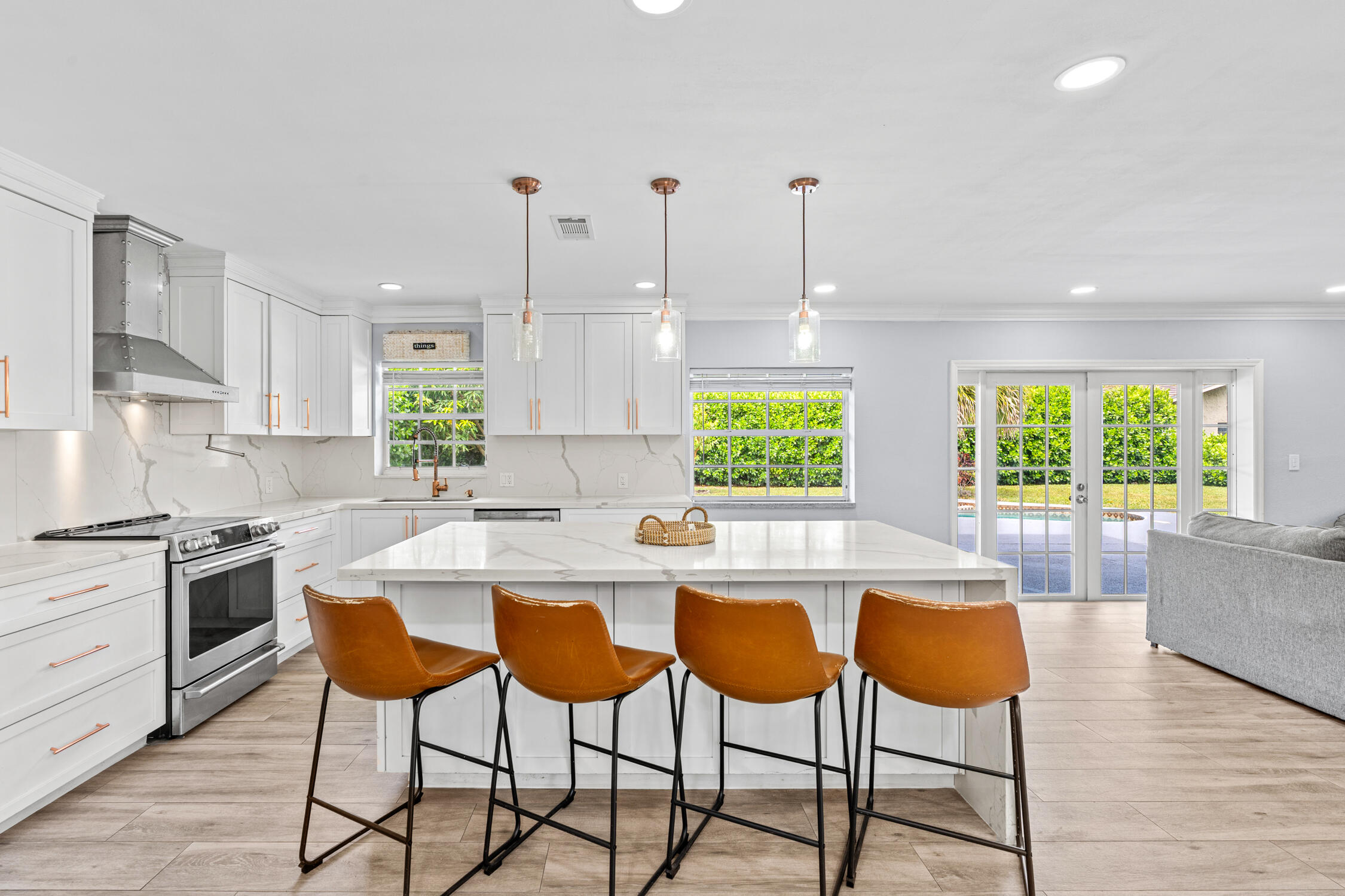 Beautifully remodeled 3-bedroom, 2-bath pool home in highly desirable Maplewood! No Hoa! Features an open floor plan, porcelain tile floors throughout, a spacious updated kitchen with large island perfect for entertaining, and a separate laundry room. Enjoy the oversized backyard with mango and other fruit trees, perfect for entertaining, kids, and outdoor living in your backyard with private pool. Conveniently located near top-rated schools, shopping, restaurants, and major highways. This home is move-in ready!