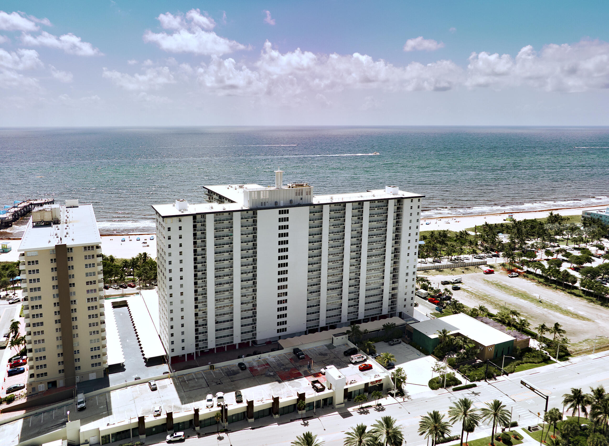 Wake up to spectacular, unobstructed ocean views in this completely renovated, fully furnished 2-bed, 2-bath condo in the heart of Pompano Beach. This move-in-ready beachfront home features an open kitchen w/ quartz, stainless appl, & breakfast bar, plus spacious living & dining areas that open to a lg. private balcony overlooking the Atlantic Ocean. Additional features incl. split-bedroom plan, impact thru/out, in-unit laundry, newer A/C, covered parking & stylish modern finishes. Residents of sought-after Sea Monarch enjoy resort-style amenities incl. oversized heated pool, fitness center & pet-friendly living. Just steps from the beach, pier, waterfront restaurants, shopping & entertainment. Now is the perfect time to experience Pompano Beach's growing luxury waterfront lifestyle!