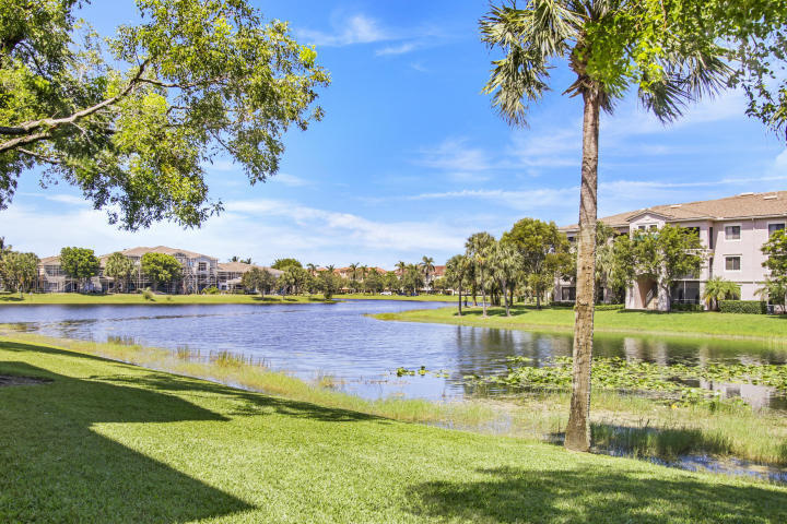 First-floor one-bedroom home with panoramic water views. Newer AC. NO carpet. Washer and Dryer in unit.  Available  August 1st.          The Tivoli model is the LARGEST one-bedroom unit in the community and has been tiled throughout by the current owner. The close proximity to The Gardens Mall and all those restaurants and shops along PGA Boulevard is the icing on the cake. The beaches and freeways are super close and just minutes to Palm Beach International Airport. Location, location, location. Water, Sewer & Trash INCLUDED. Financial requirements. Credit 650 or greater, verifiable income to support rent.