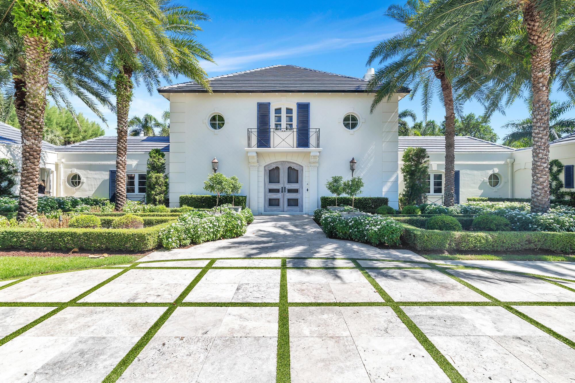 Stylishly remastered and beautifully appointed with gracious luxury details, this casually elegant Bermuda-style estate is enhanced by  charming architectural features that deliver a fashion-forward look.  On nearly an acre on a private cul-de-sac near ocean beach access, the fabulous backyard oasis is highlighted by a gas fireplace, while sparkling fountains arc over the new  50±-ft. pool. LOCATION:

Bermuda Lane, Gulf Stream, Florida: Prized for its unspoiled natural setting and exceptional quality of life, prestigious Gulf Stream lies in the heart of South Florida's Gold Coast between Palm Beach and Boca Raton. World-class shopping and dining, noted cultural attractions, and myriad recreational opportunities are all within easy reach of this preeminent locale.

PROPERTY:

On nearly one acre in a private cul-de-sac setting between The Little Club and Gulf Stream School with access to the ocean beach nearby, lush gardens beautify both the front of the residence and the fabulous backyard oasis. In the sprawling outdoor entertainment space, the pergola and summer kitchen flow out to the patio, where soothing fountains arc over the new sun-splashed 50±-foot saltwater pool and sparkling spill-over spa just adjacent to the romantic gas fireplace.

RESIDENCE:

Stylishly remastered and beautifully appointed with gracious luxury details, this casually elegant Bermuda-style estate is enhanced by charming architectural features that deliver a fashion-forward look. In a clean, light palette grounded by floors of rich oak, porcelain tile, marble and slate, this four-bedroom masterpiece, spanning 5,488± total square feet, is introduced by a stunning foyer and a sweeping stairwell that flow out to the large light-filled great room. Crowned by a beamed ceiling, which is lined with bamboo paneling, and highlighted by a wood-burning fireplace, French doors from the great room lead out to the poolside pergola, inviting easy indoor/outdoor entertaining and family living. The casual dining area, topped by a cathedral ceiling, is open to the showpiece kitchen, which is finished with Calacatta Gold marble counters, a sizeable island/bar, and professional-grade appliances that include a Wolf gas range, Sub-Zero refrigerator/freezer, Miele dishwasher, and dual Vinotemp wine coolers. An office/bedroom, with en-suite bathroom, is just adjacent, while in the opposite wing are the family/media room, sunlit office, and  two guest bedrooms that share a bathroom. With a split-bedroom plan, the completely private primary suite presides over the second floor. The airy bedroom, topped by a tray-ceiling, serves as a romantic haven, and the suite's French doors open to the verandah overlooking the pool and gorgeous greenery. Completing the suite are two walk-in closets and two spa-inspired marble bathrooms, one with a soaking tub and shower. Completing the overall floor plan are a laundry, powder room and a two-bay garage with new motorized garage doors. Amenities include two enlarged hot-water heaters, a new driveway, new pool finishes and equipment, new Heston BBQ with an ice machine and a cooler, and three new HVAC systems. This chic residence offers for opportunity for wonderful beach-style living.



The information herein is deemed reliable and subject to errors, omissions or changes without notice.  The information has been derived from architectural plans or county records. Buyer should verify all measurements

DISCLAIMER: Information published or otherwise provided by the listing company and its representatives including but not limited to prices, measurements, square footages, lot sizes, calculations, statistics, and videos are deemed reliable but are not guaranteed and are subject to errors, omissions or changes without notice. All such information should be independently verified by any prospective purchaser or seller. Parties should perform their own due diligence to verify such information prior to a sale or listing. Listing company expressly disclaims any warranty or representation regarding such information. Prices published are either list price, sold price, and/or last asking price. The listing company participates in the Multiple Listing Service and IDX. The properties published as listed and sold are not necessarily exclusive to listing company and may be listed or have sold with other members of the Multiple Listing Service. Transactions where listing company represented both buyers and sellers are calculated as two sales. "No payments made until title passes" Some affiliations may not be applicable to certain geographic areas. If your property is currently listed with another broker, please disregard any solicitation for services. Information published or otherwise provided by seller, listing company or its representatives is deemed reliable but are not guaranteed and subject to errors, omissions, or changes without notice. Copyright 2024 by the listing company. All Rights Reserved.