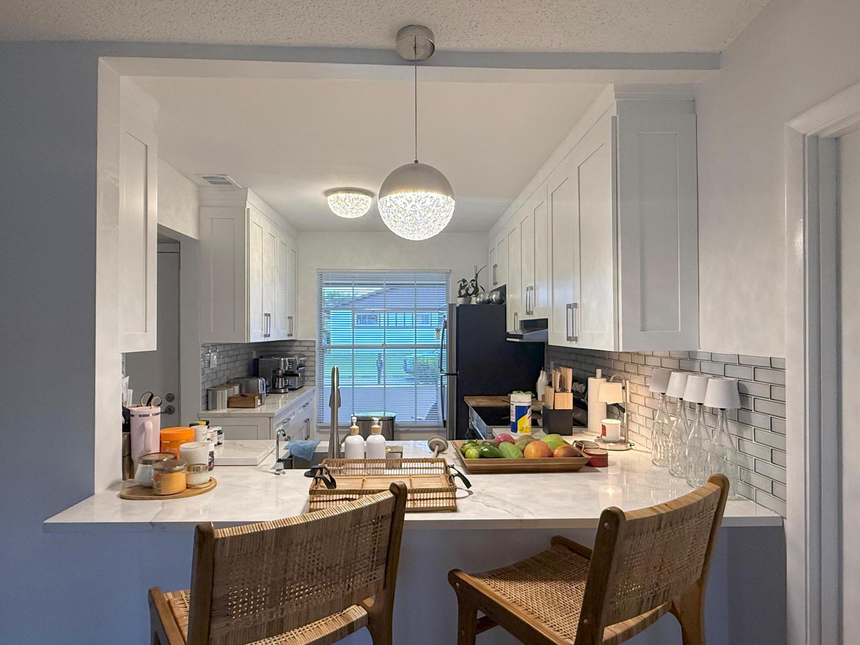 Discover the perfect blend of comfort and elegance in this beautifully upgraded 2-beds, 2-baths Villa, nestled within the sought-after Las Verdes 55+ community. This rare rental opportunity offers a serene lifestyle, featuring a spacious backyard with picturesque views of a quiet lake—the ideal spot for your morning coffee or sunset relaxation. Features a private one-car garage with an in-garage laundry. All-Inclusive living: your monthly rent covers basic wi-fi, cable, water, and trash removal. Premium amenities including a clubhouse, swimming pool, tennis courts, and fitness center. For nature lovers, the community is laced with scenic trails.Las Verdes is just 10 minutes from the vibrant shops and fine dining of Delray's Atlantic Ave and also close to Delray Medical Center and highways.