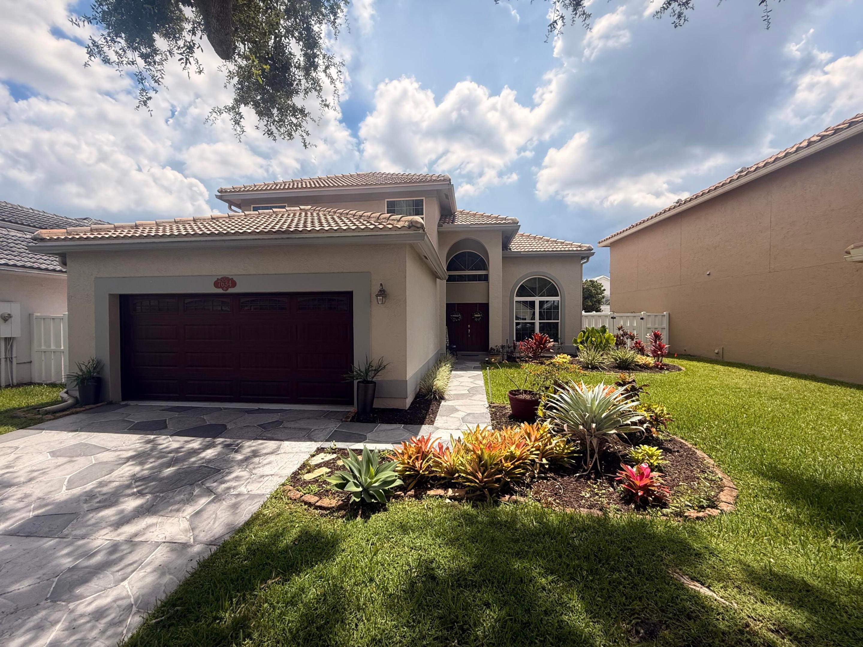 Looking for the perfect family home in a welcoming, family friendly neighborhood? Your search ends here! Welcome to this beautifully maintained 4BR 3BA home in the highly sought after Lake Charleston community.  Offering 2,392 SF of thoughtfully designed living space, this 2-story residence combines comfort, functionality, and style. The bright, open floor plan features spacious living and dining areas, a well-appointed kitchen, and inviting spaces ideal for both everyday living and entertaining. The versatile 4th BR is currently configured as a den, making it perfect for a home office, playroom, media room or guest suite to suit your lifestyle.  Additional highlights include a 2-car garage, generous storage, and a private backyard with pool in a coastal environment.   Ideally located near top-rated schools, parks, shopping, dining, and the outstanding amenities that make Lake  Charleston one of the area's most desirable communities, this house offers the perfect blend of convenience and Florida living. Come experience everything this exceptional home has to offer.   Additional Features include: 1. Impact windows and doors 2. Plantation shutters 3. Laundry room complete with cupboards and a sink 4. New AC ducts (2026) 5. Pool resurfaced 2025 6. New roof (installed 2021 with 7 years remaining on warranty) 7. Rheem water heater installed 2021 8. Lennox AC installed 2015  9. Ring doorbell