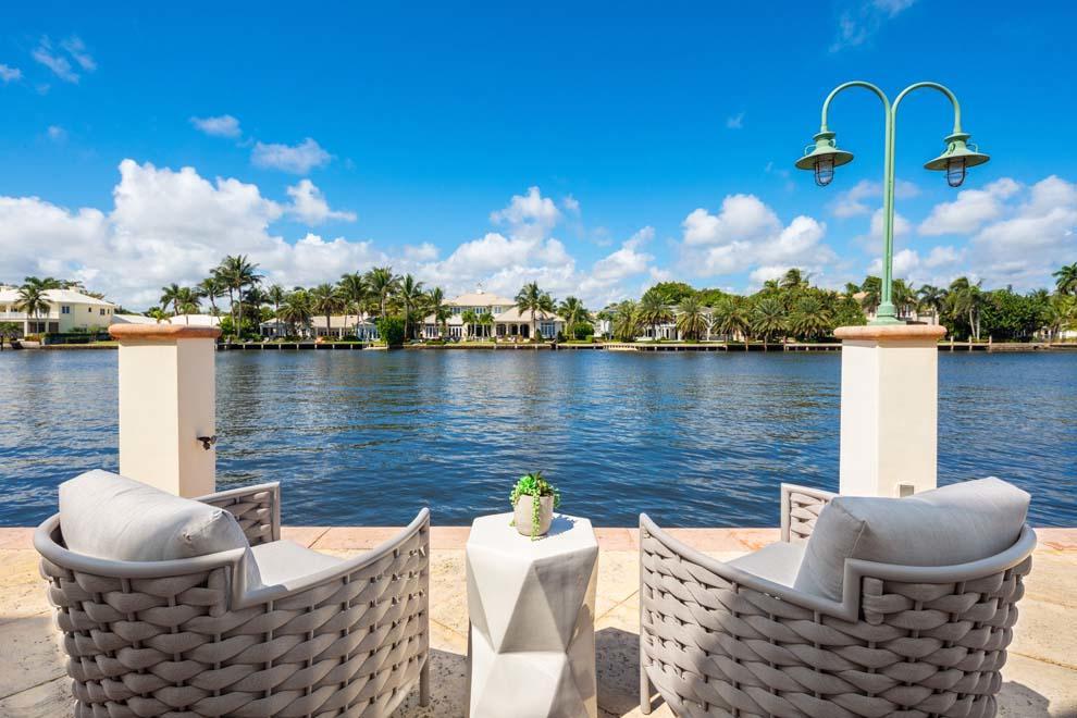 Best waterfront value in East Delray Beach! Boasting 130 feet of direct Intracoastal waterfrontage 1001 Vista del Mar offers an incredible opportunity to enjoy South Florida Luxury Living! Located just blocks from the ocean and Atlantic Avenue, the five bedroom residence features stunning water views, formal and casual living, open gourmet kitchen, office, recreation room with theater screen, master wing, elevator and full-house generator. Enjoy outdoor living with covered loggia, expansive balcony and pool with spa and cabana half bath. Recreational boaters and serious yachtsmen alike will appreciate the 110 foot dock with boat lift and nearby inlets for ocean access. Tucked away on a quiet street in the beach area with absolutely incredible wide water views. Created to exude a casual elegance, the five-star estate enjoys picturesque water and sunset views throughout. Custom and quality built  in 2004, the two-story residence offers plenty of space for residents and guests alike.

Features Include:
*130 Feet Direct Intracoastal Waterfrontage
*110 Foot Private Dock with 24,000 Pound Boat Lift
*Five Bedrooms
*Six Full and Three Half Baths
*6,672 Square Feet Under Air
*9,043 Total Square Feet
*Custom Finishes Including Dentil and Crown Moldings
*Two Windowed Cupolas with Custom Lighting
*Rosewood Grand Staircase
*Crema Valencia Marble and Hardwood Floors with Inlay
*Onyx Countertops
*Gourmet Kitchen with Island, Snack Bar and Dining Area
*Open Casual Living Area with Full Service Wet Bar
*Formal Living Room with Gas Fireplace
*Formal Dining Room
*Butler's Pantry and Wine Coolers
*First Floor Office
*Multi-Function Recreation Room with Full-Size Theater Screen and Private Waterside Terrace
*First Floor En Suite Guest Room and Three En Suite Guest Rooms on Second Floor
*Loft Area at Top of Landing with Balcony Access
*Master Wing with Fireplace, Morning Bar, Balcony Access and Dual Master Baths and Walk-In Closet
*French Doors Throughout
*Oversized Windows for Natural Light and Endless Water Views
*Beach-Entry Heated Pool with Pebble Finish and Cascading Rock Spa
*Cabana Half Bath
*Covered and Open Decorative Patios with Room for Outdoor Dining and Lounging
*Expansive Waterside Balcony with Several Access Points
*Manicured Grounds with Decorative Driveway and Terraces
*Second Floor Laundry Room
*Side-Entry Three-Bay Air Conditioned Garage
*Full-House Generator
*Security System
*Central Vacuum
*Five-Zone Air Conditioning System