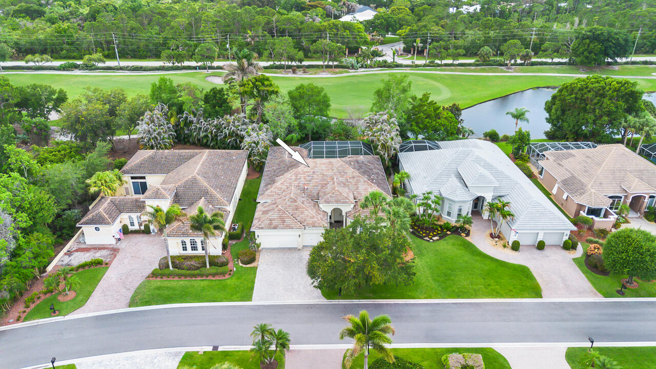 Discover luxury living in Palm Cove Golf & Yacht Club in this rare single-story estate home offering sparkling lake views, a large screened pool, soaring ceilings, abundant natural light, and an open-concept floorplan designed for entertaining. Featuring oversized rooms, 3 bed plus an office and a 3-car garage, this well-priced residence is the only single-story estate home currently available in Palm Cove with boat slips available for purchase at the end of the street! Enjoy resort-style amenities including a 93-slip community marina on the St. Lucie River with easy ocean access.  The HOA includes security, Blue Stream fiber cable & internet, a riverfront clubhouse with pool, fitness center, tot lot, tennis & vibrant calendar of social events. There's a private 18-hole golf course & restaurant with memberships avail. Enjoy Martin County "A" schools, parks, marinas, world-class fishing, shopping, dining & live theater in award-winning Downtown Stuart. Easy access to I-95, FL Turnpike & beautiful Hutchinson Island beaches. This is a rare opportunity to own a luxury home w/boating access in one of Palm City's premier golf and yacht communities.