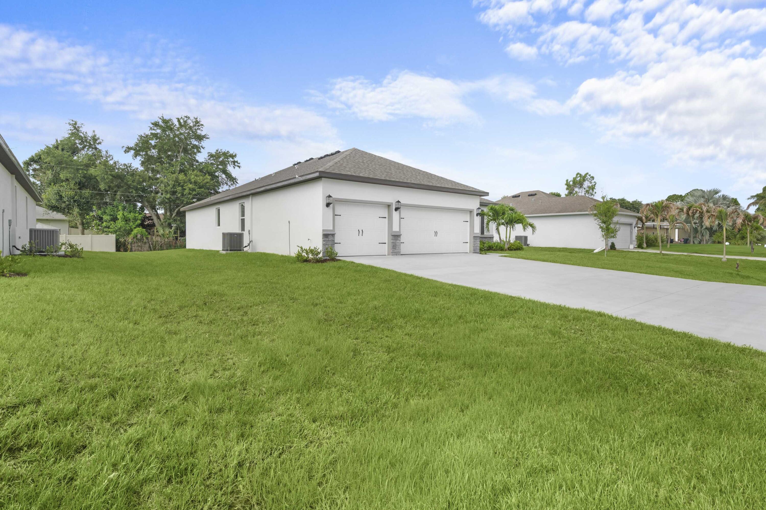 Ask about our builder-paid closing costs and no down payment options! The Key West, located in the highly desirable Port St. Lucie area, is move-in ready and offers exceptional value. This spacious one-story home boasts 5 bedrooms, 3 full baths, and a highly functional open-concept layout. Included upgrades are energy-efficient Whirlpool® appliances, expansive granite countertops, elegant wood cabinetry, brushed nickel hardware, and a two-car garage. The Key West also features a covered back patio, front yard landscaping, and a master suite with a large walk-in closet. Located near top-rated schools, shopping, dining, and parks. *Appliance models subject to availability. *