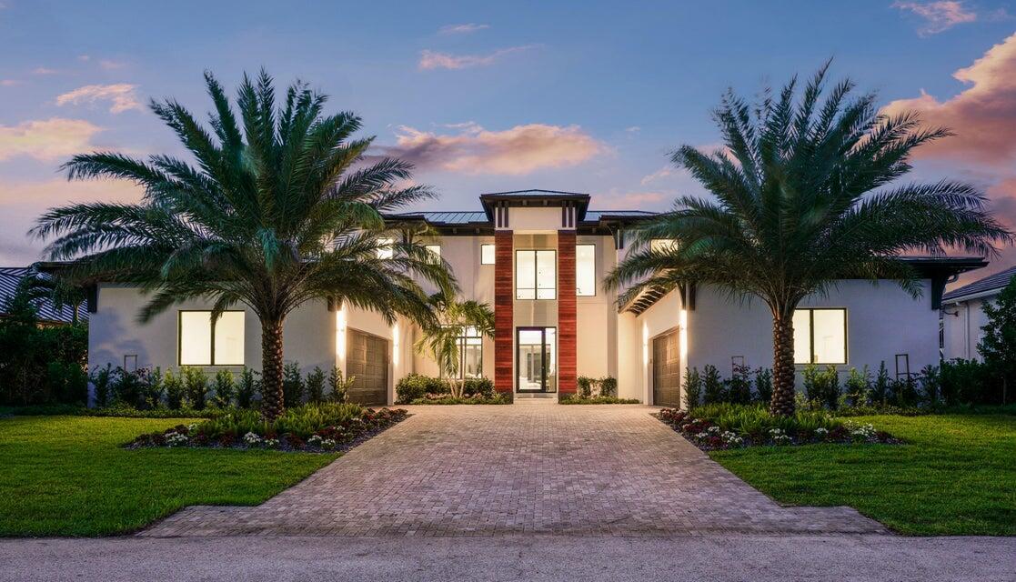 Enjoy this Custom Waterfront Home on Singer Island. Sitting on a deep water canal with 100 feet of waterfront with direct ocean access. This Home is located on Palm Beach Isles! A Boat Lover's and Water Lover's Paradise. Enjoy the sleek Euro Edged Pool with beautiful Sunset views. New Dock and large covered patio with a Summer Kitchen.  Large space 6500 sq ft layout for this 6 bedroom 7 bath estate. Two temperature controlled garages. This is a smart home and features tons of automation. A true Florida Paradise.