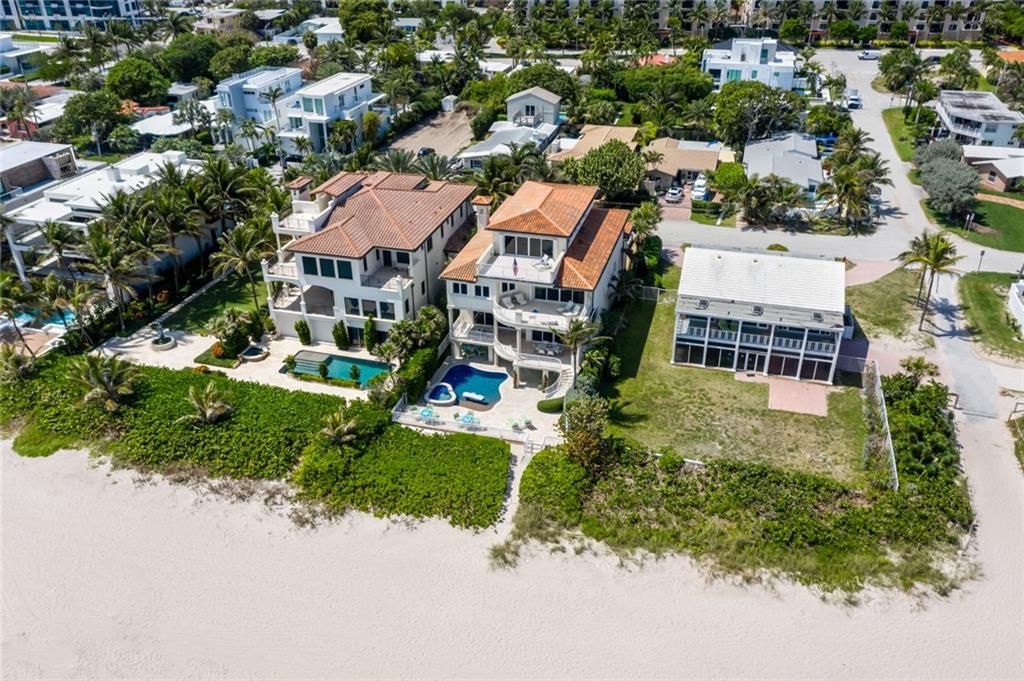 One of less than 50 homes in Ft Lauderdale directly on the sand - Villa Atlantique is Ft Lauderdale's ultimateBEACH HOUSE! Nestled on 53 ft of pristine beachfront this magnificent BEACH HOUSE won't disappoint! Thesweeping open floor plan embraces the ocean from the moment that you step inside - floor to ceiling glasswindows & doors & large wrapping terraces awaken the senses. The huge gourmet kitchen is a chefs delight &perfect for entertaining. The spacious floor plan offers the calm and tranquility of oceanfront living. The amazingmaster suite w/private oceanfront terrace has large his and her (oceanfront) baths & huge closets. Completingparadise are 2 spacious guest bedroom suites, office, huge 4th floor office w/sitting room, bar and w/terrace,poolside family room & bar.