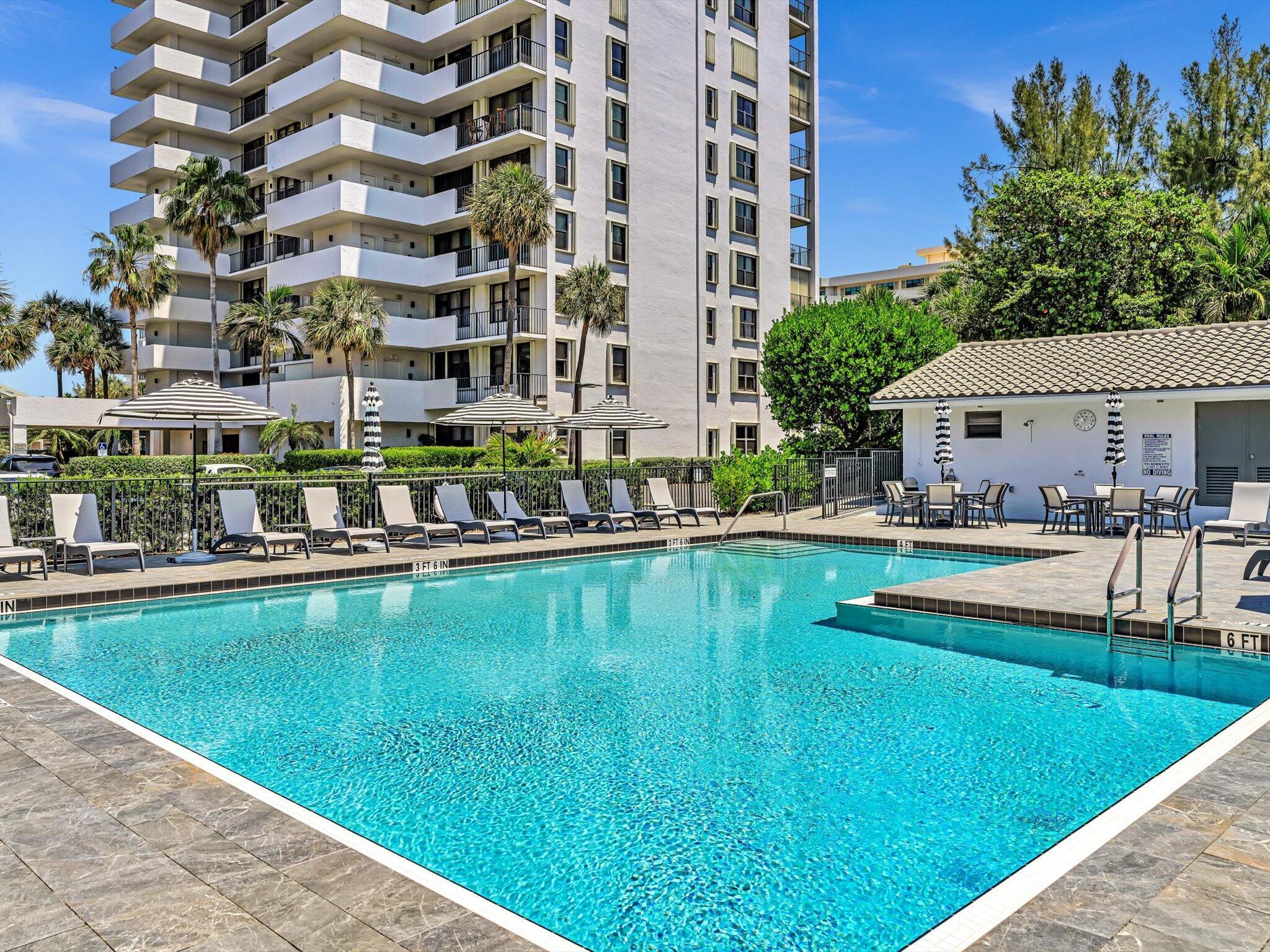 Welcome home to this meticulously renovated and beautifully furnished 2-bedroom, 2-bathroom unit nestled in the prestigious Carron House condominium in Highland Beach on Ocean Boulevard, a state-of-the-art Private Beach Club House with spectacular ocean views. The building milestone inspection has been completed, and the building has been newly painted.  This condo is on the 5th floor.  A spacious living room opens to a large covered, recessed patio with partial ocean views. Hurricane impact sliding doors and windows, blinds with controllers. Spectacular and serene views of palm trees from both bedrooms. Porcelain tile floor throughout, eat-in kitchen, white quartz countertop, porcelain tile backsplash, washer/dryer in the unit, two walk-in closets plus   abundant storage spaces. Semi-private elevator opens to only two units per floor. Maintenance fees include building insurance, cable TV with HBO plus high-speed internet, and water/sewer fees. Community amenities include a private beach club on the sand, a marina, an exercise room, a social/card room, a library, a kitchen, BBQ grills, pickleball and tennis courts, and a new pool.  A must see !!