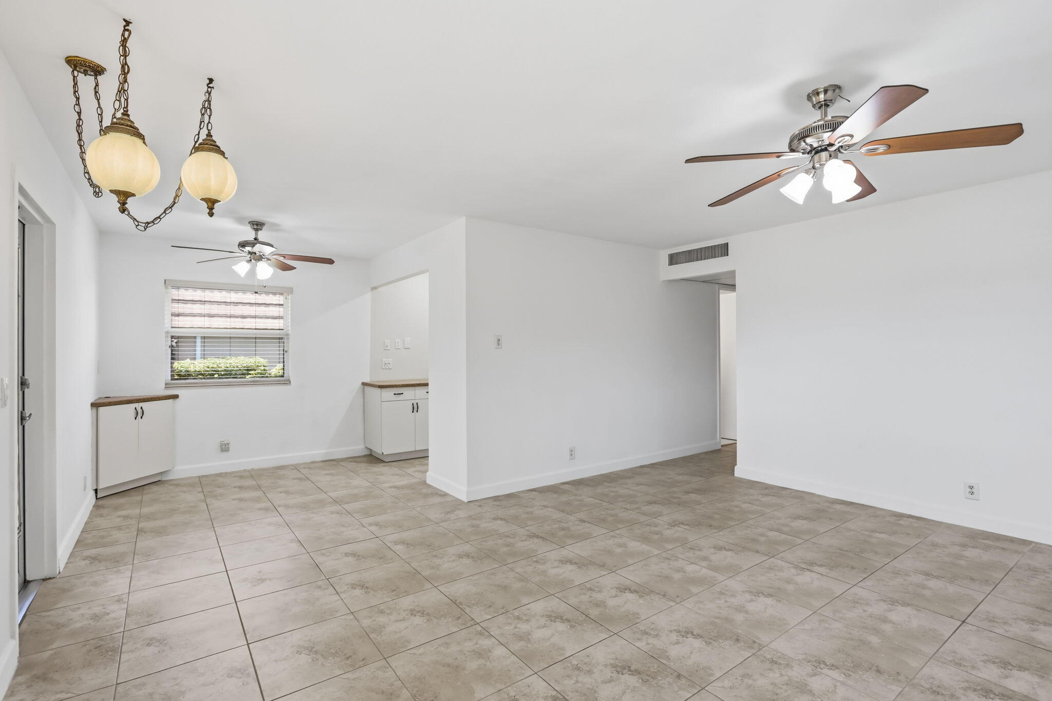 This highly updated two bedroom, two bath first floor end Unit is a true gem. Just bring your furnishings and move right in and start enjoying all the resort style amenities that Kings Point has to offer. This Unit features upgraded flooring throughout, including the patio which provides separate wall air conditioning, creating a perfect spot to sit back, relax and enjoy. The open side of the home offers impact glass windows for complete relaxation, while the newer roof and water heater provide additional peace of mind. The Kings Point community is perfectly located within minutes of downtown Delray Beach, and its wonderful shops, restaurants and attractions. Your South Florida lifestyle awaits!